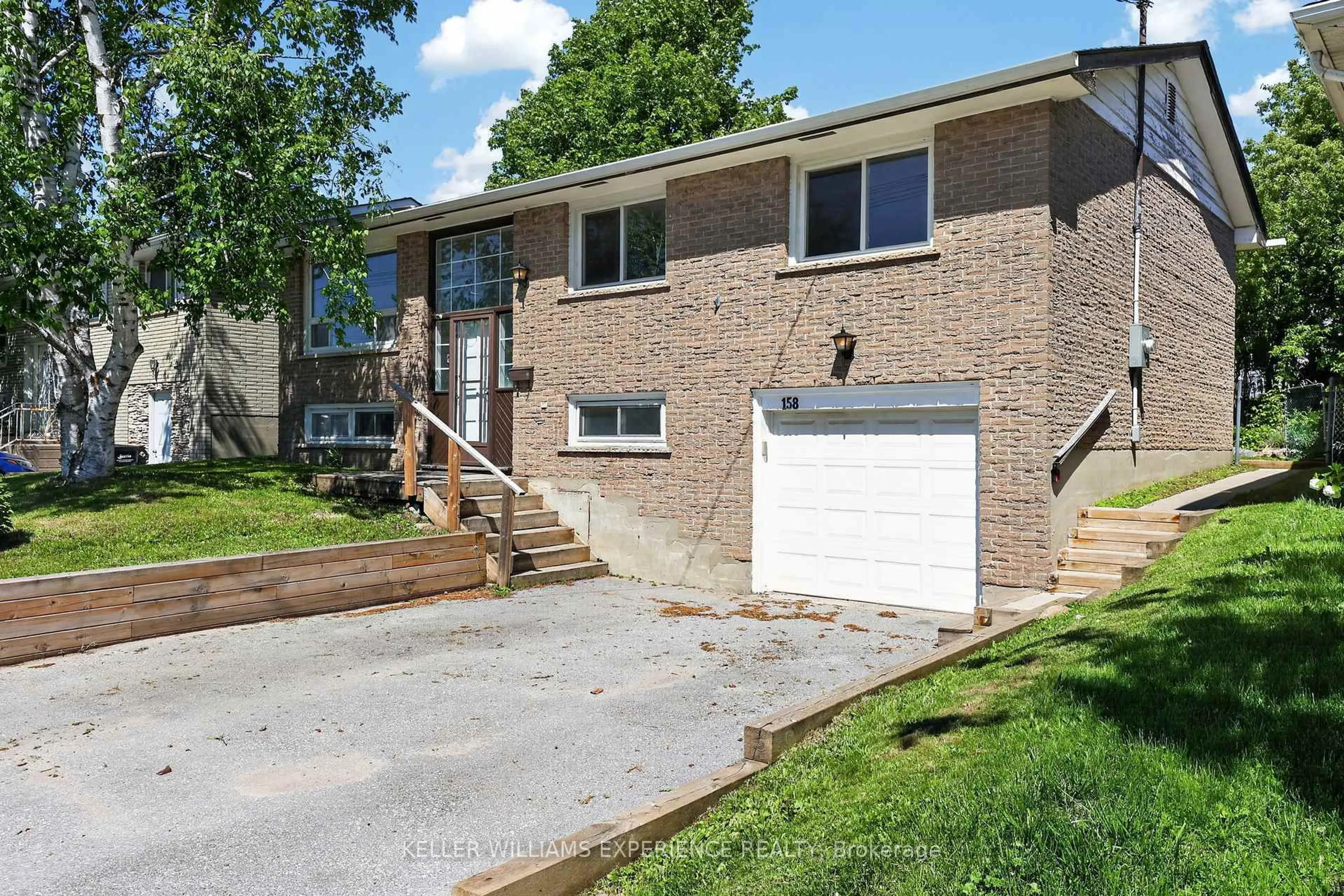 Home with brick exterior material, street for 158 CUNDLES Rd, Barrie Ontario L4M 2Z9