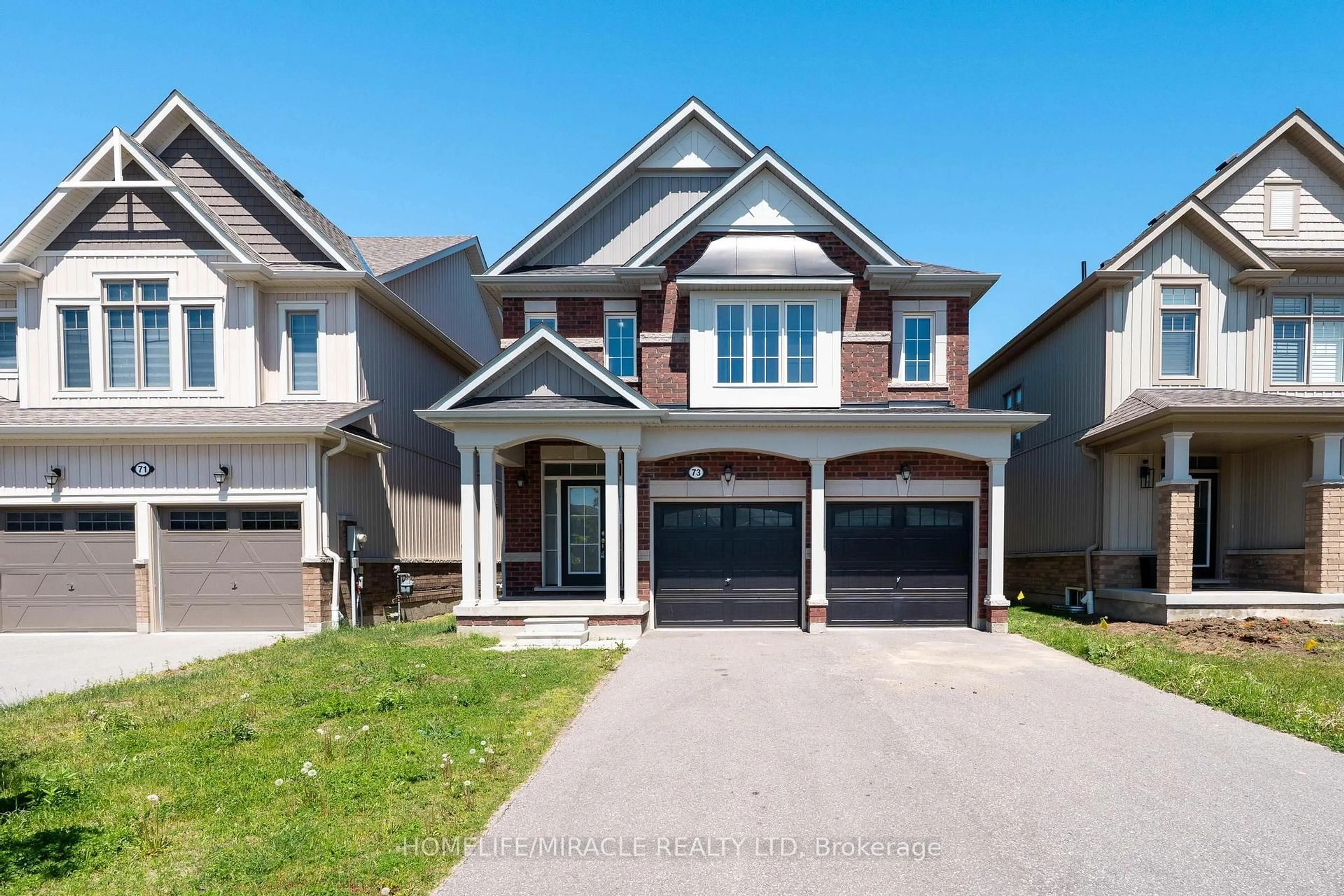 Home with brick exterior material, street for 73 Tracey Lane, Collingwood Ontario L9Y 3V2