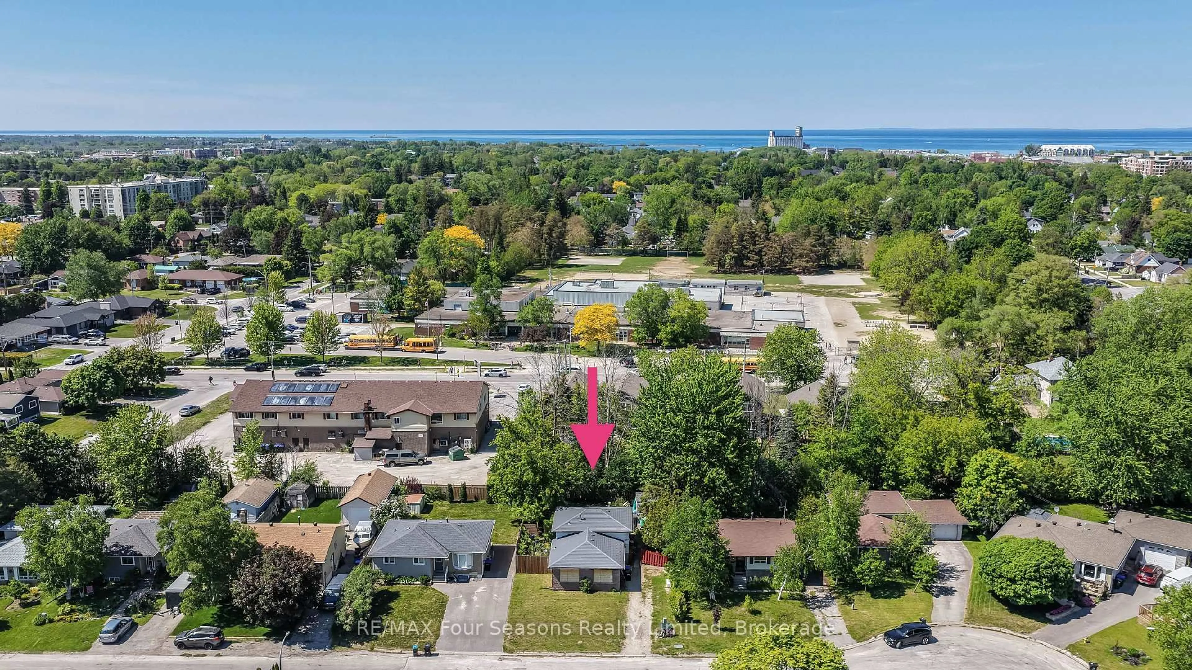 A pic from outside/outdoor area/front of a property/back of a property/a pic from drone, water/lake/river/ocean view for 10 Rhonda Rd, Collingwood Ontario L9Y 4G4