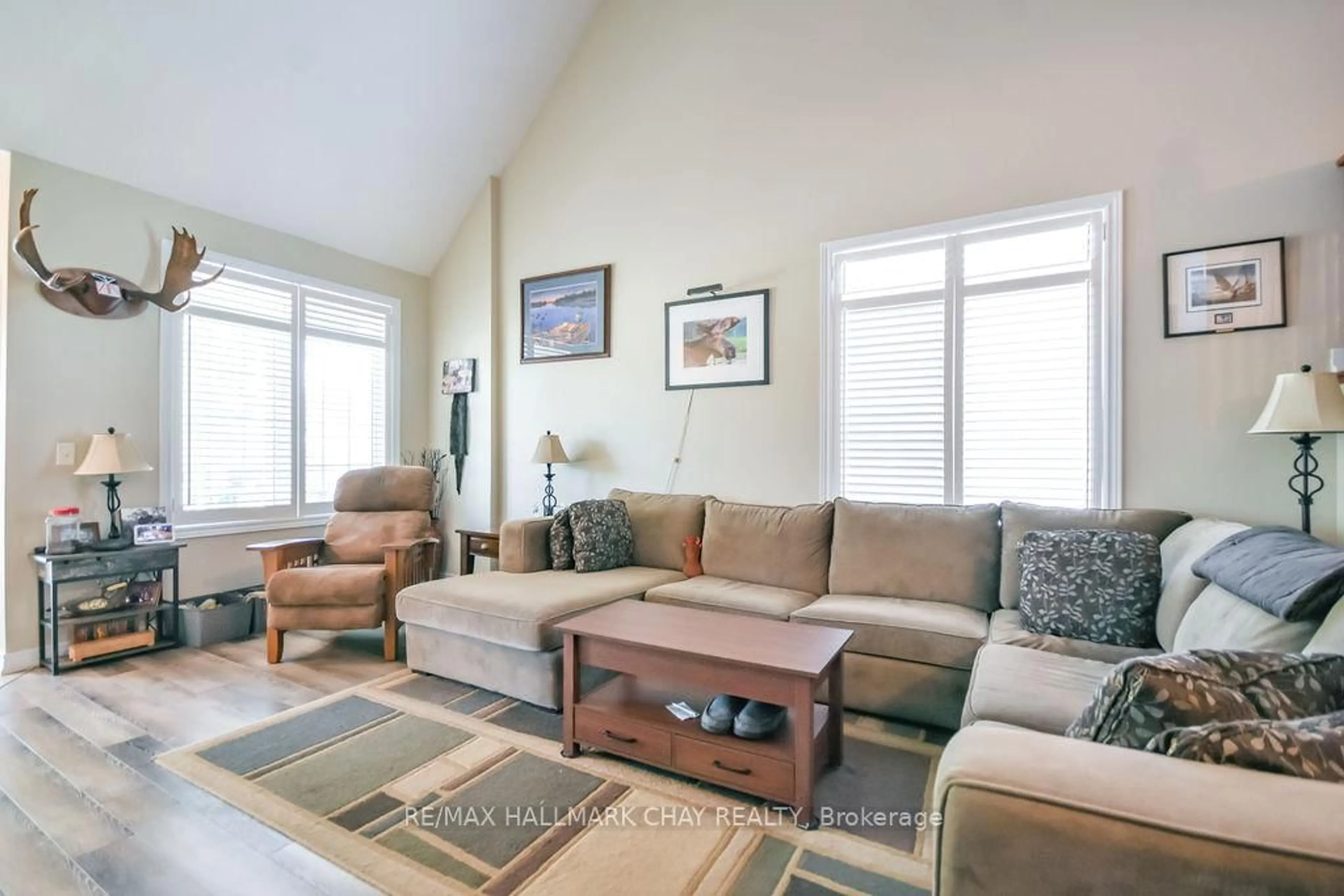 Living room with furniture, unknown for 34 Meadowood Dr, Wasaga Beach Ontario L9Z 3B9