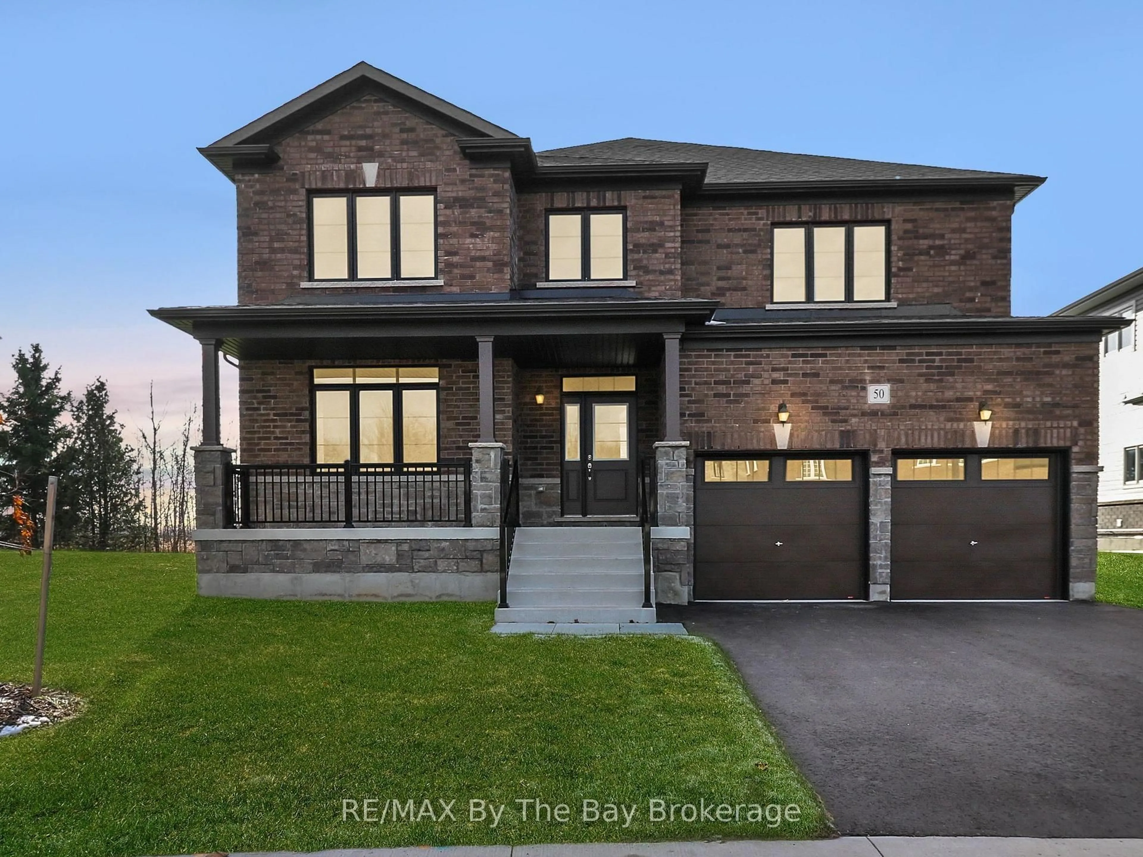 Home with brick exterior material, street for 50 Amber Dr, Wasaga Beach Ontario L9Z 0R8