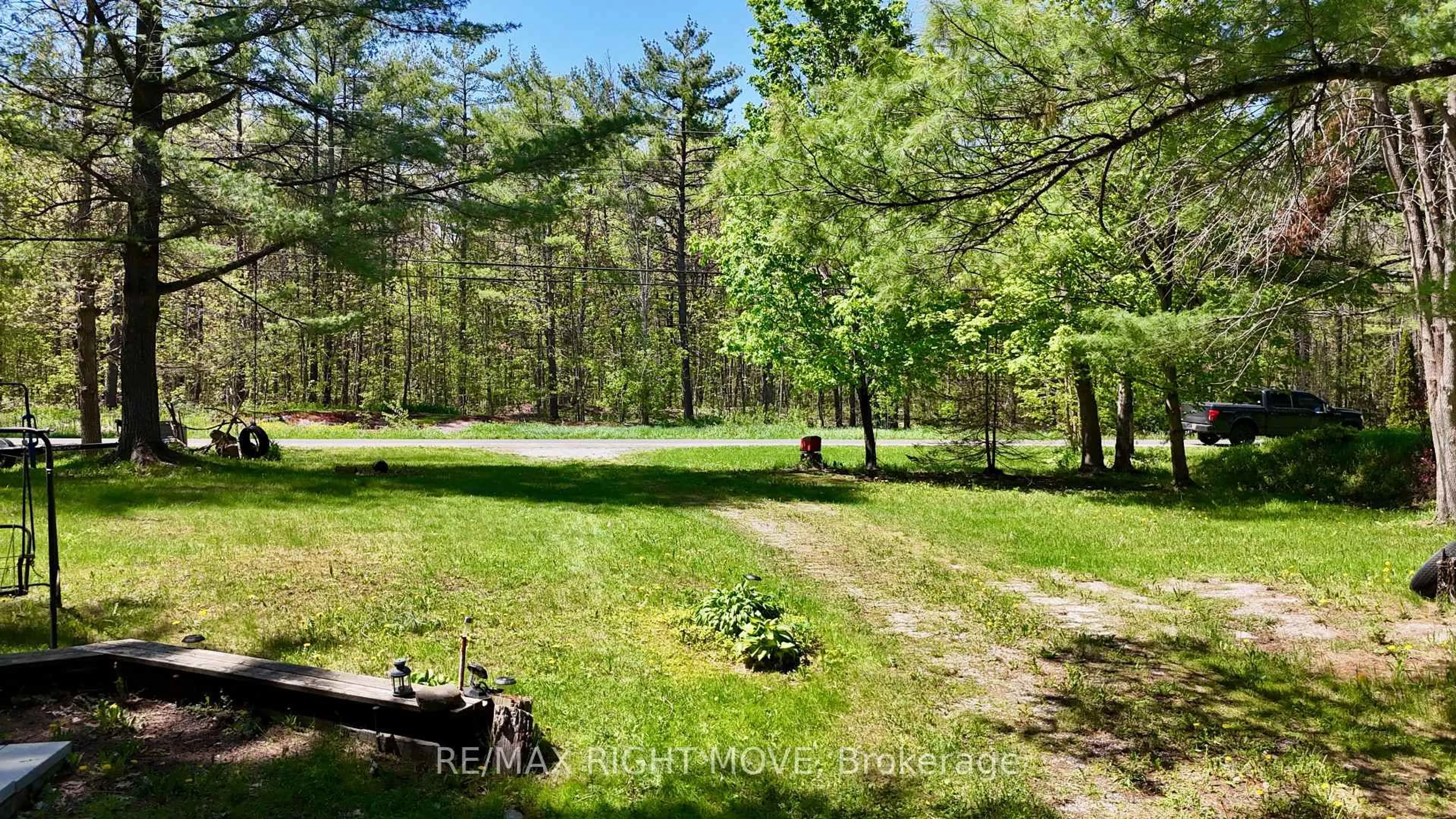 A pic from outside/outdoor area/front of a property/back of a property/a pic from drone, forest/trees view for 7785 Oakridge Dr, Ramara Ontario L0K 2B0