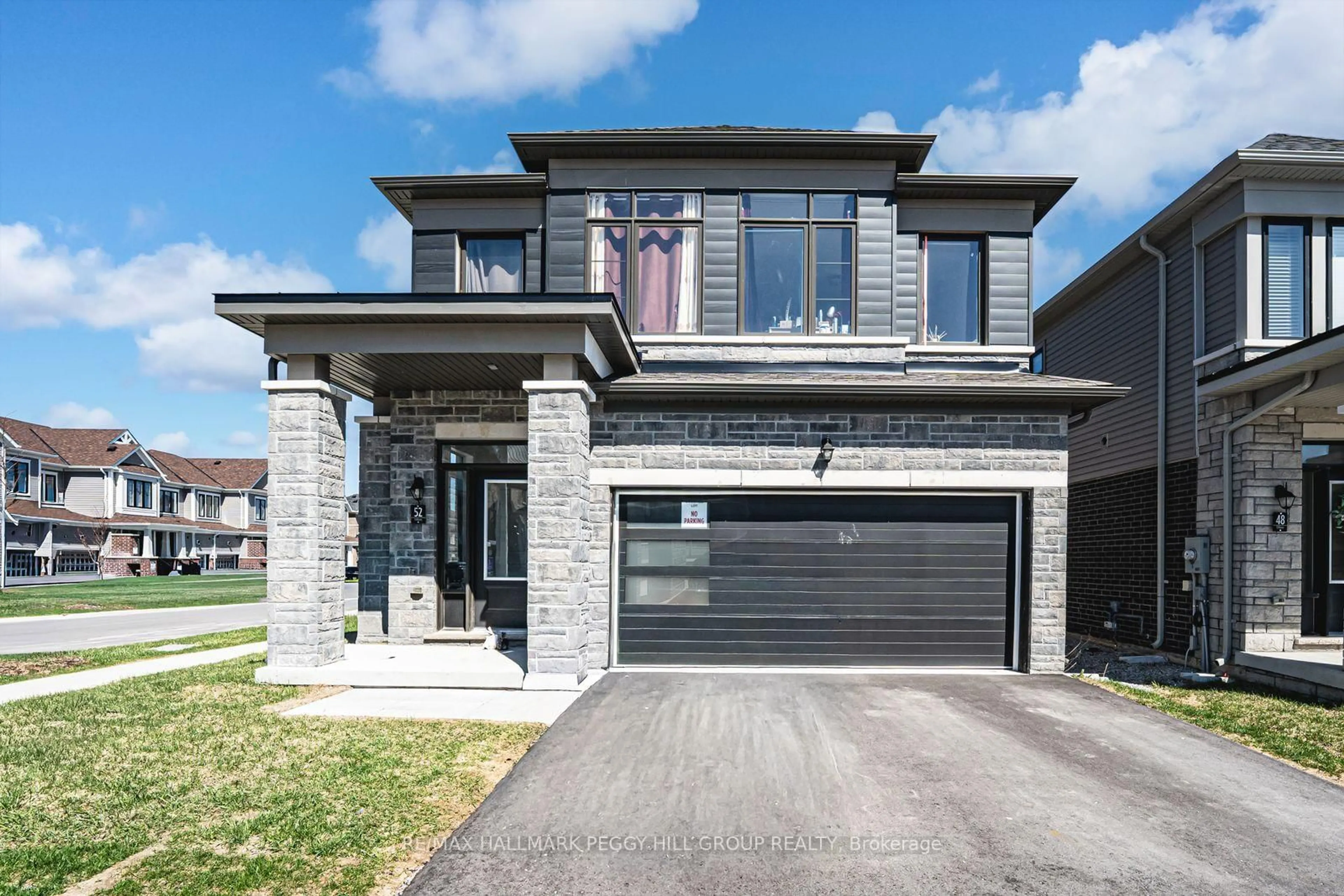 Home with brick exterior material, street for 52 Durham Ave, Barrie Ontario L9J 0W7
