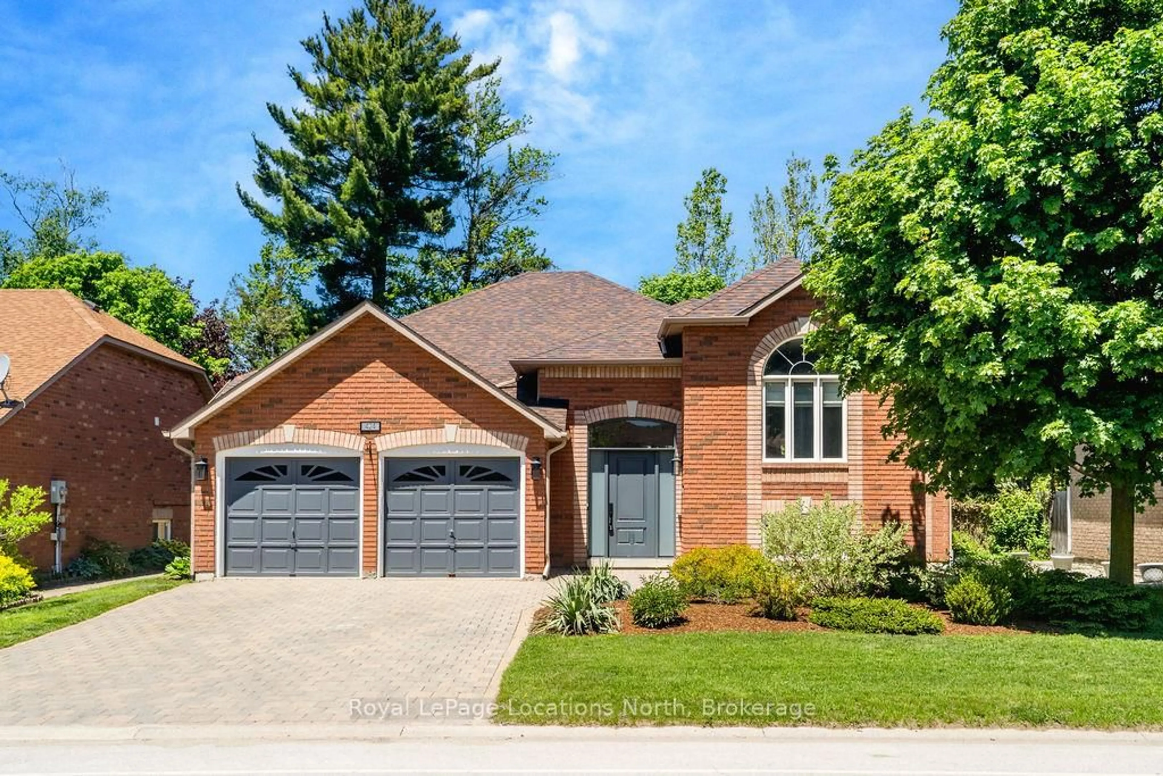 Home with brick exterior material, street for 424 Ramblewood Dr, Wasaga Beach Ontario L9Z 1P3