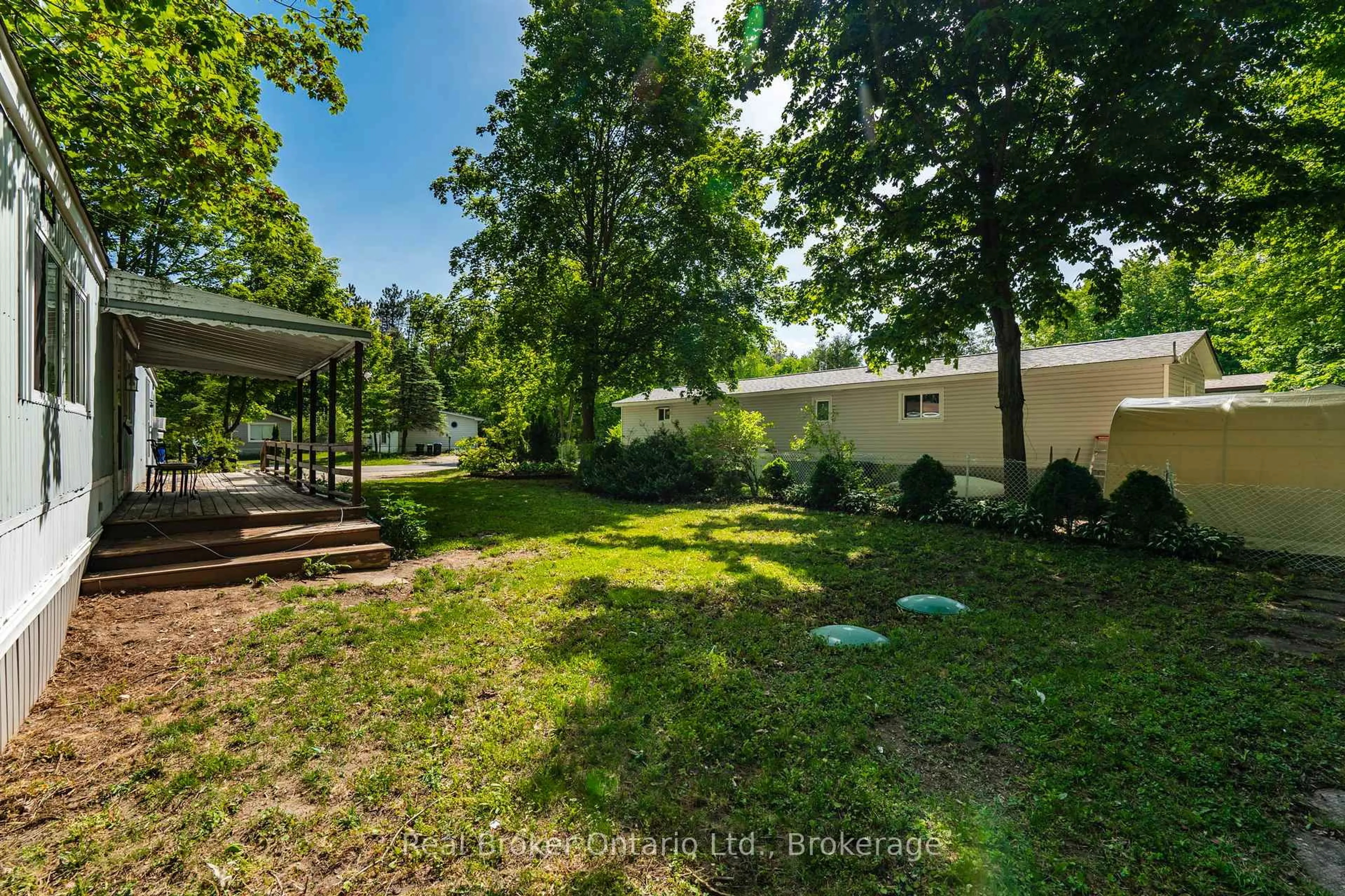 A pic from outside/outdoor area/front of a property/back of a property/a pic from drone, unknown for 5263 Elliott Sdrd #48, Tay Ontario L4R 4K3
