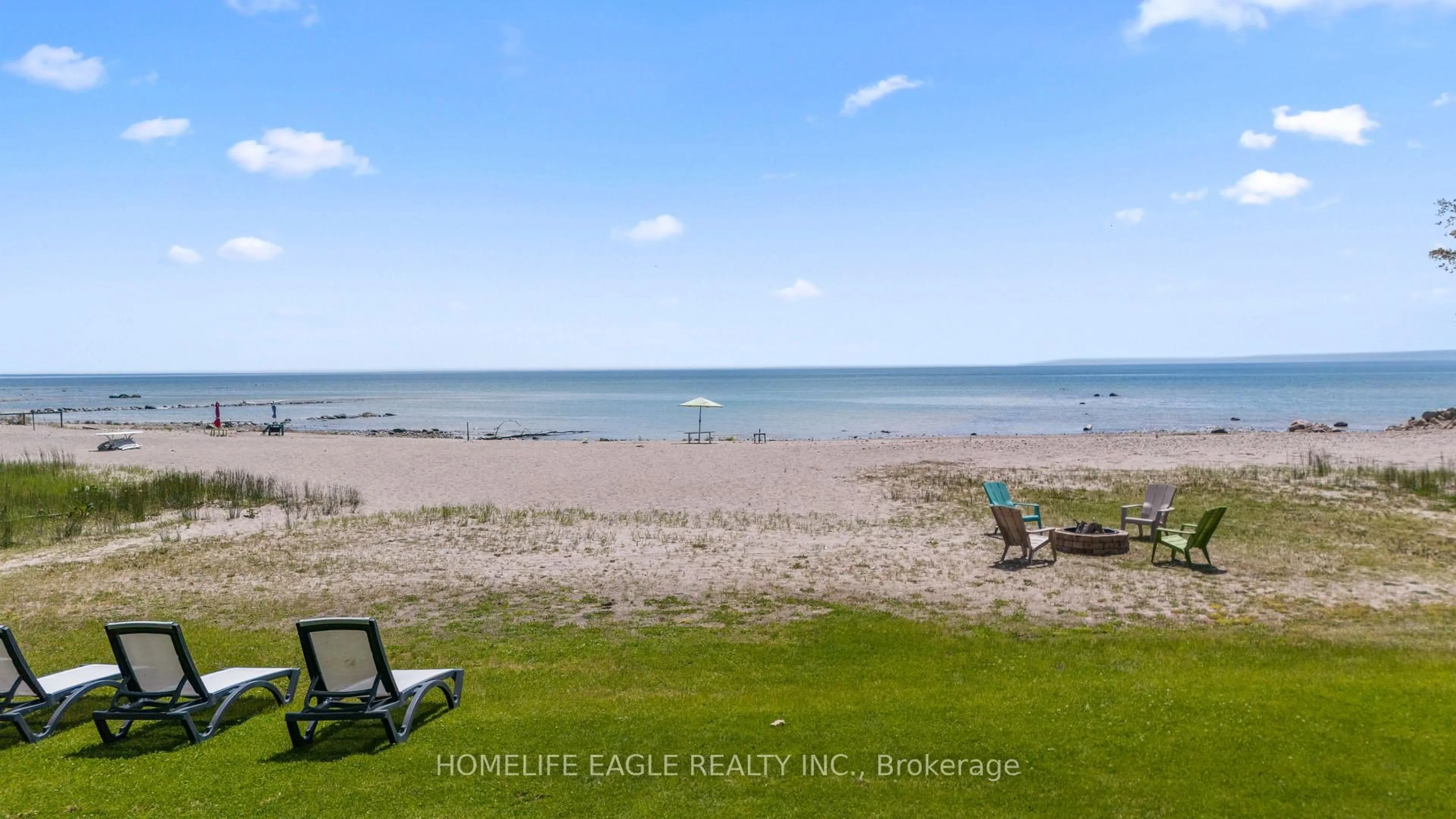 A pic from outside/outdoor area/front of a property/back of a property/a pic from drone, water/lake/river/ocean view for 1496 Tiny Beaches Rd, Tiny Ontario L9M 0J2