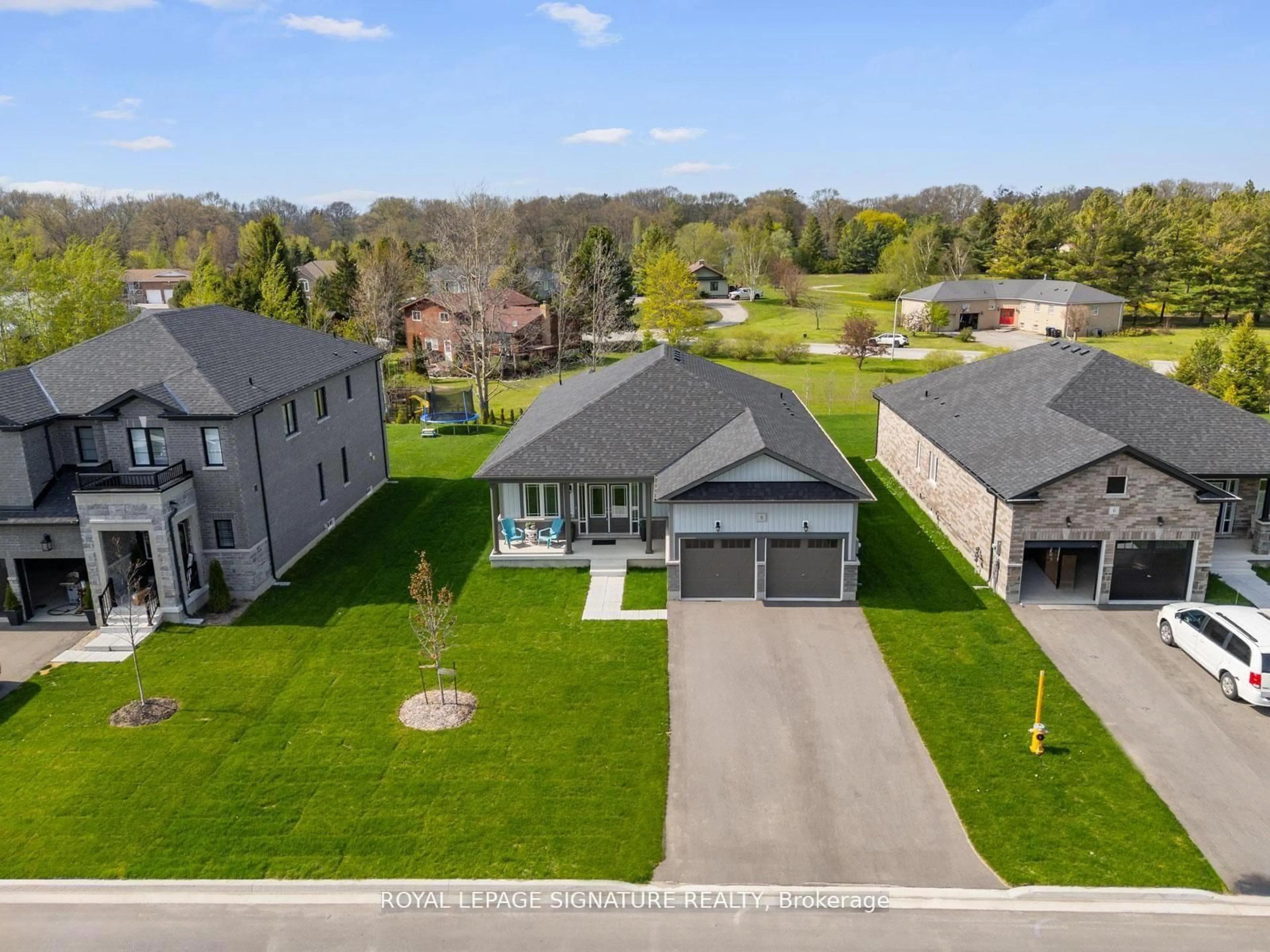 A pic from outside/outdoor area/front of a property/back of a property/a pic from drone, street for 8 Misty Ridge Rd, Wasaga Beach Ontario L9Z 0R8