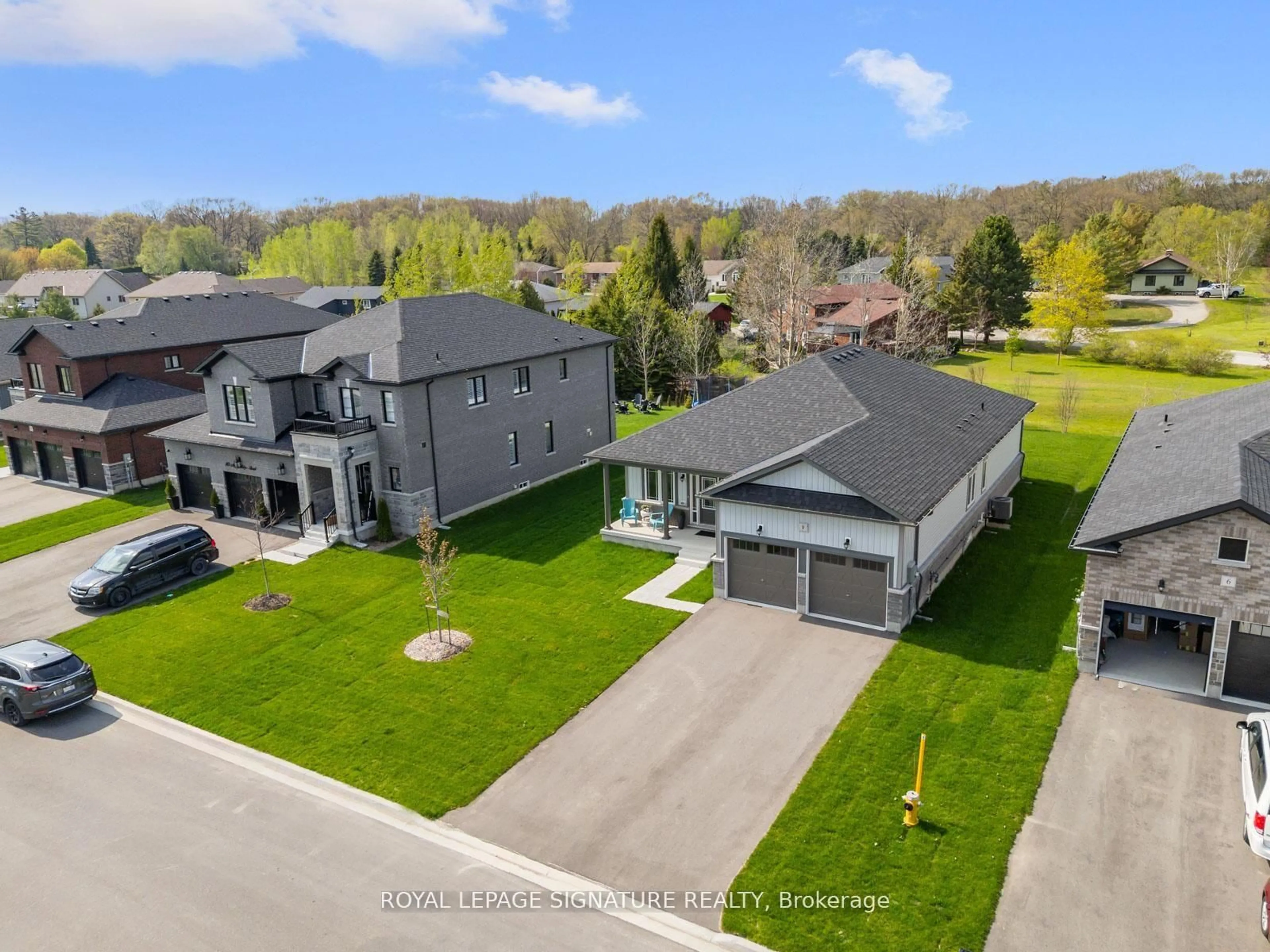 A pic from outside/outdoor area/front of a property/back of a property/a pic from drone, street for 8 Misty Ridge Rd, Wasaga Beach Ontario L9Z 0R8