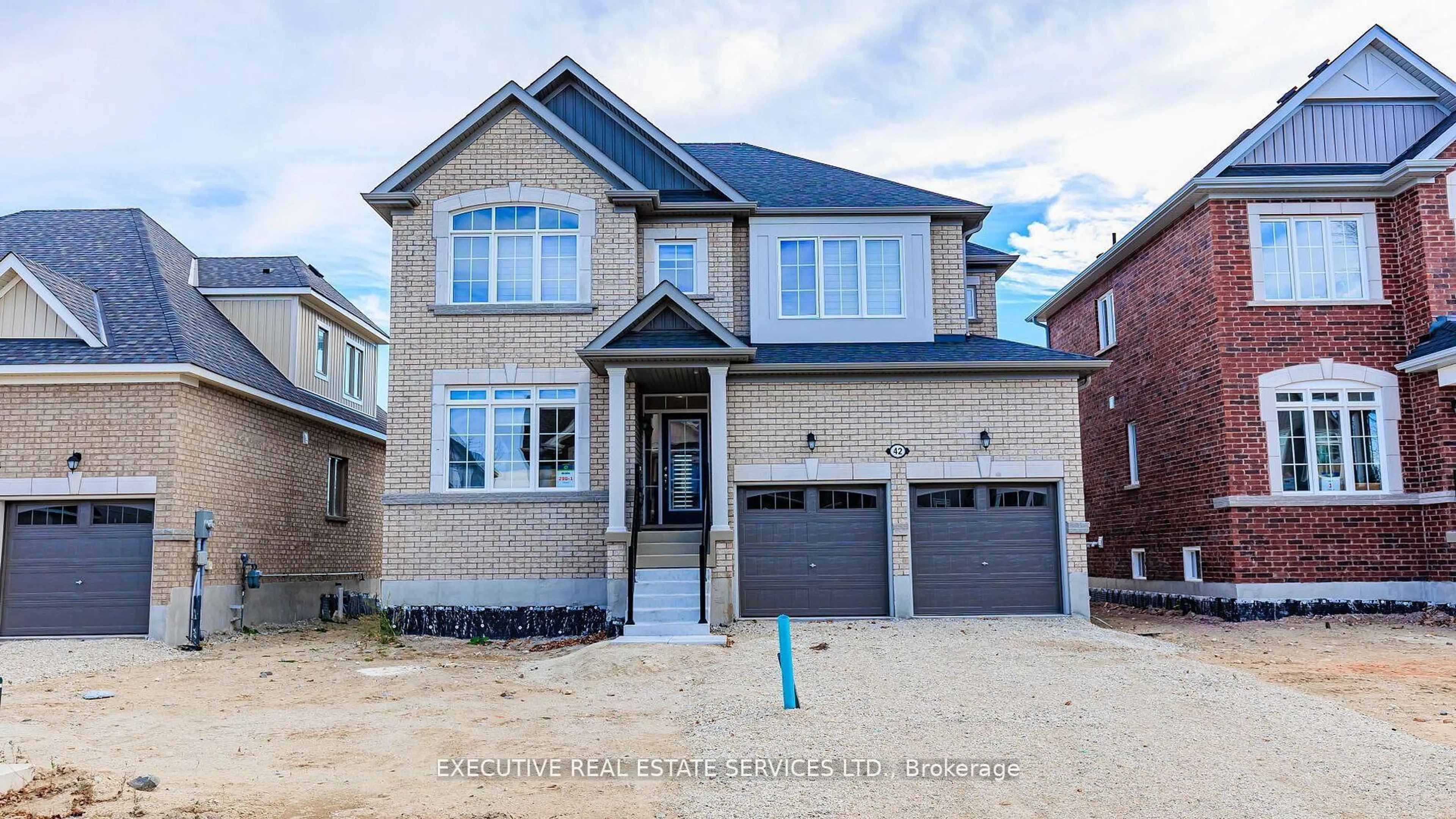 Home with brick exterior material, street for 42 Tracey Lane, Collingwood Ontario L9Y 3L7