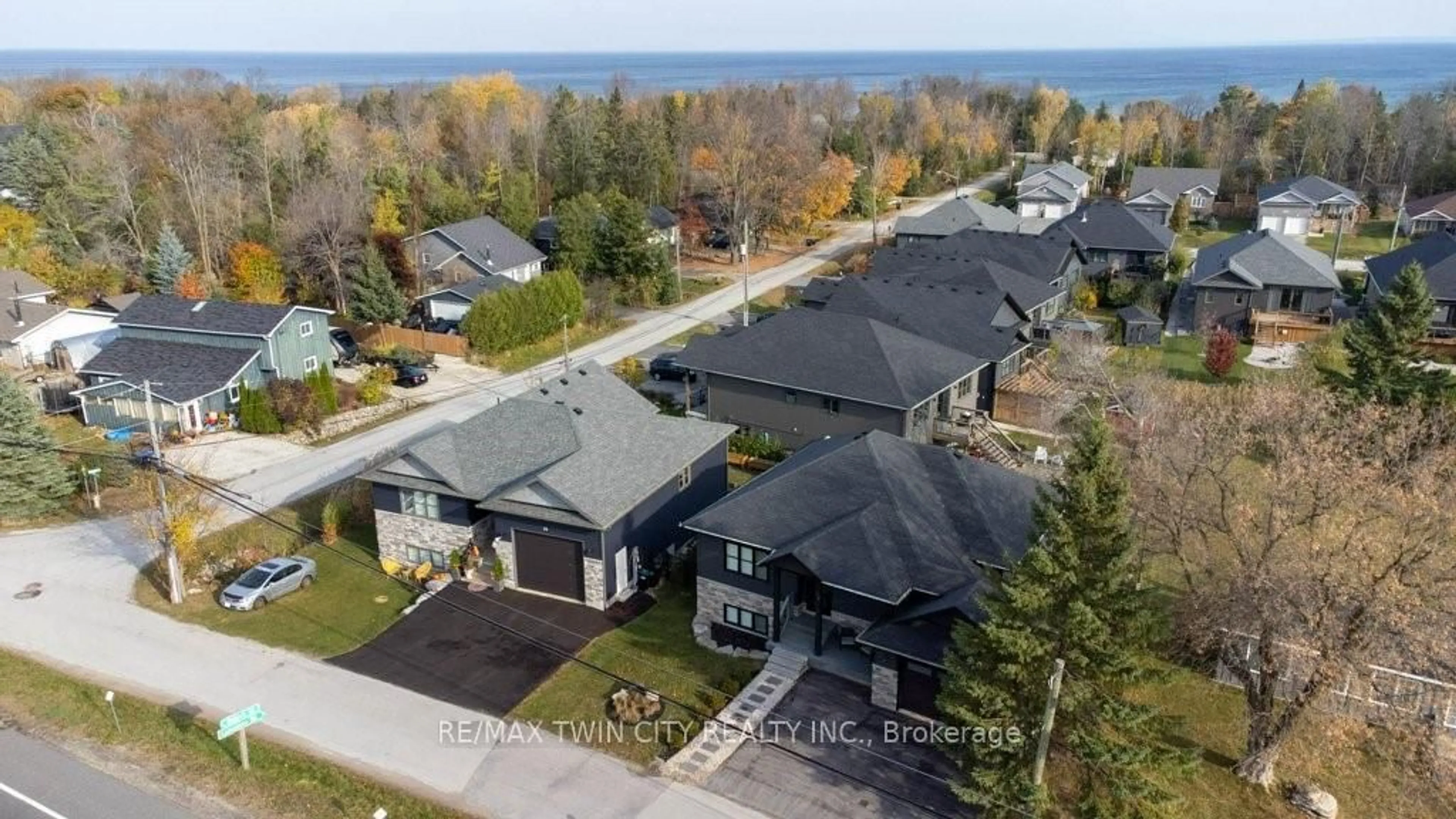 A pic from outside/outdoor area/front of a property/back of a property/a pic from drone, water/lake/river/ocean view for 30 Lakeshore Rd, Wasaga Beach Ontario L9Z 2Y3