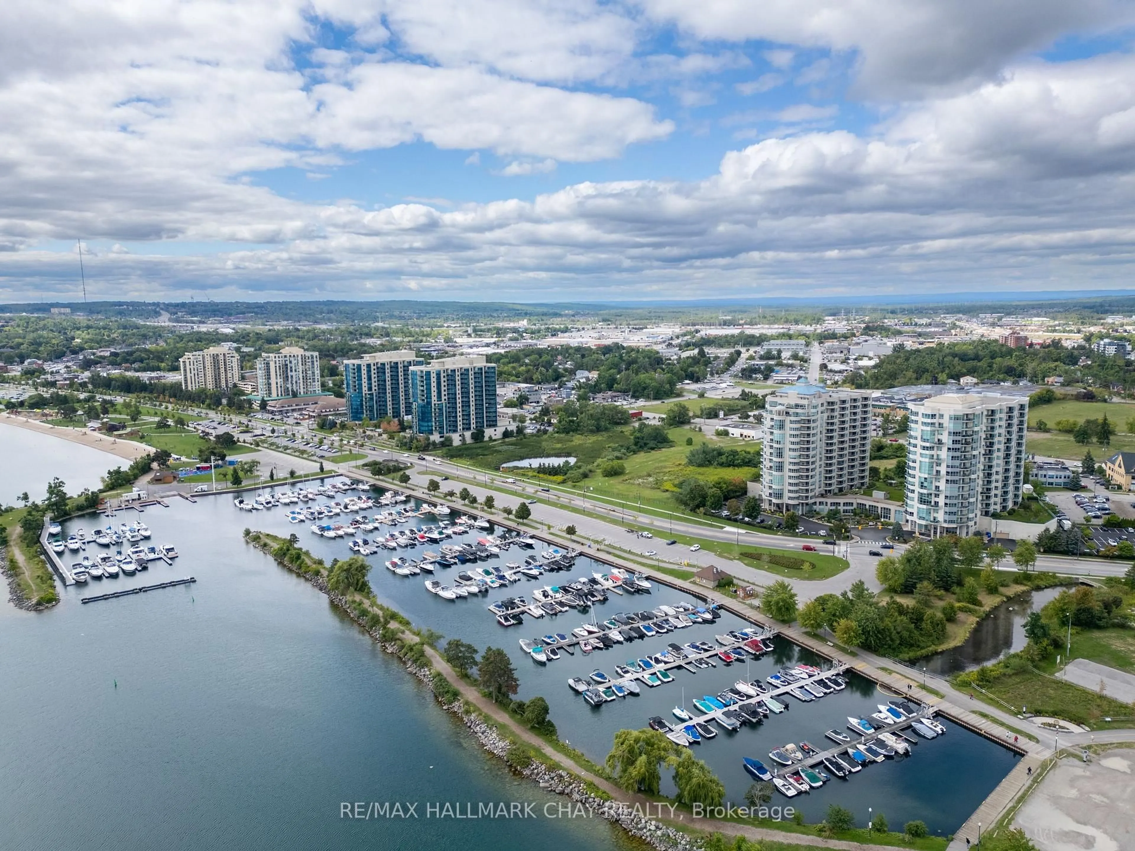 A pic from outside/outdoor area/front of a property/back of a property/a pic from drone, water/lake/river/ocean view for 2 Toronto St #310, Barrie Ontario L4N 9R2