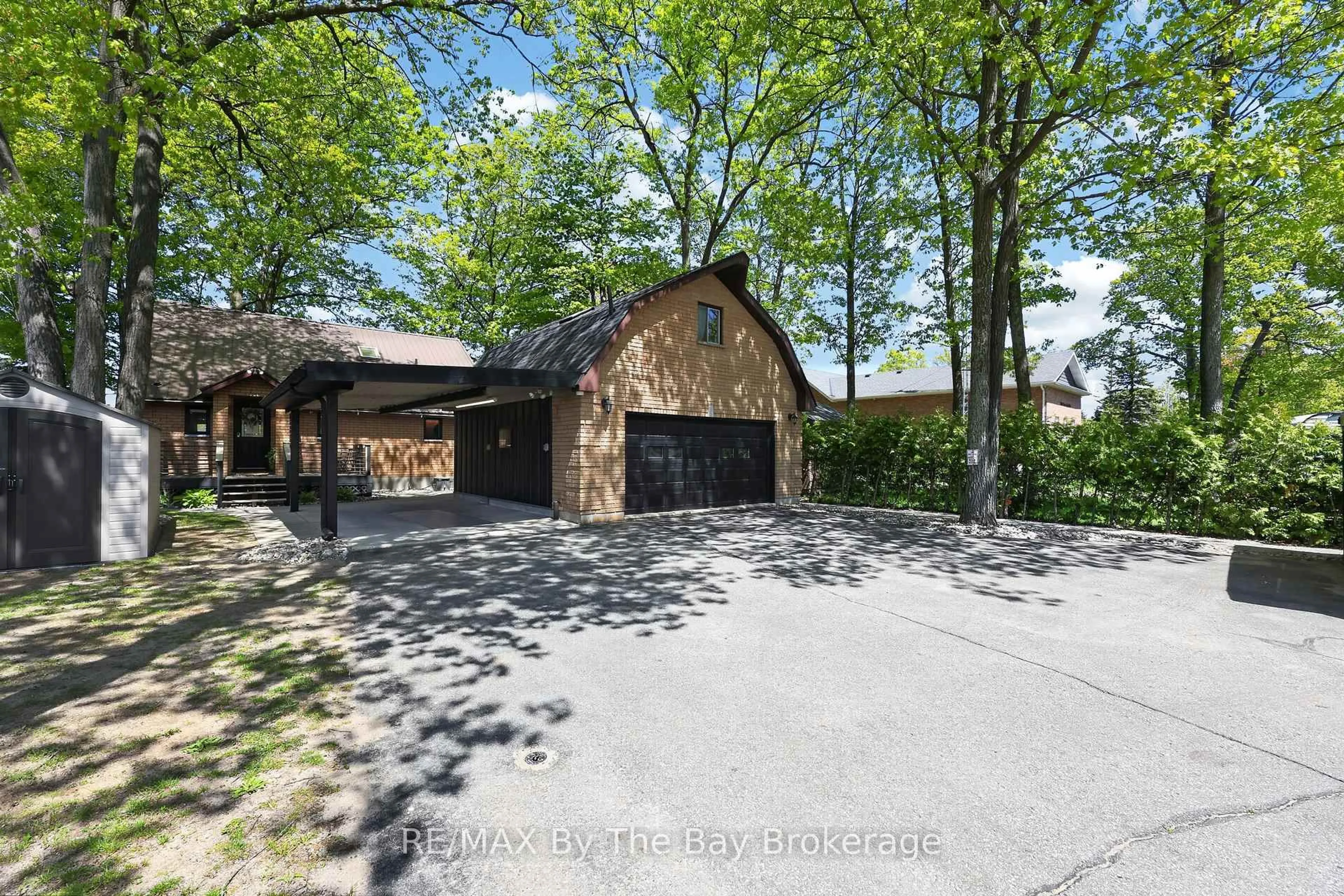 A pic from outside/outdoor area/front of a property/back of a property/a pic from drone, street for 1416 River Rd, Wasaga Beach Ontario L9Z 2W5