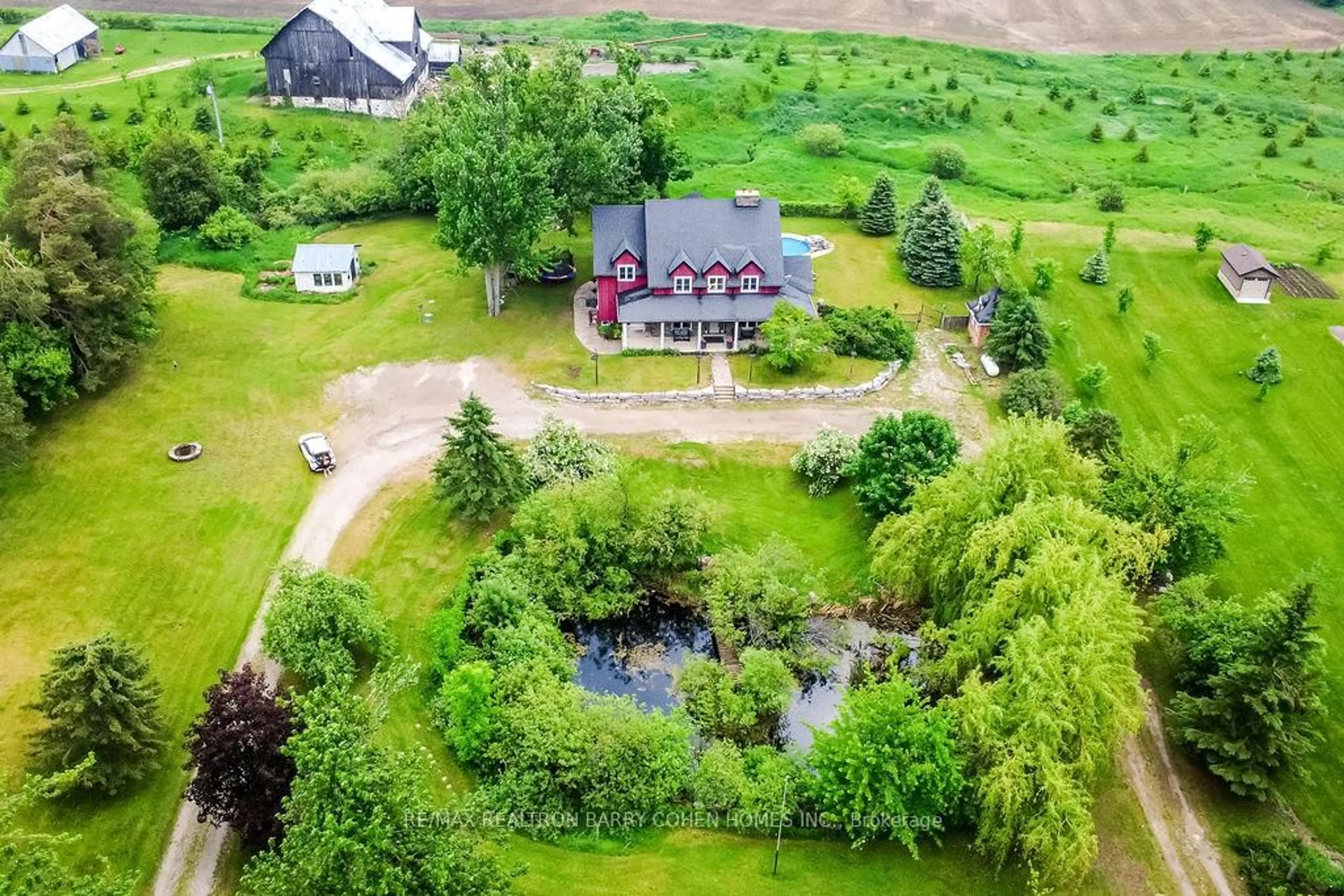 A pic from outside/outdoor area/front of a property/back of a property/a pic from drone, water/lake/river/ocean view for 303 9 Line, Oro-Medonte Ontario L0L 1T0