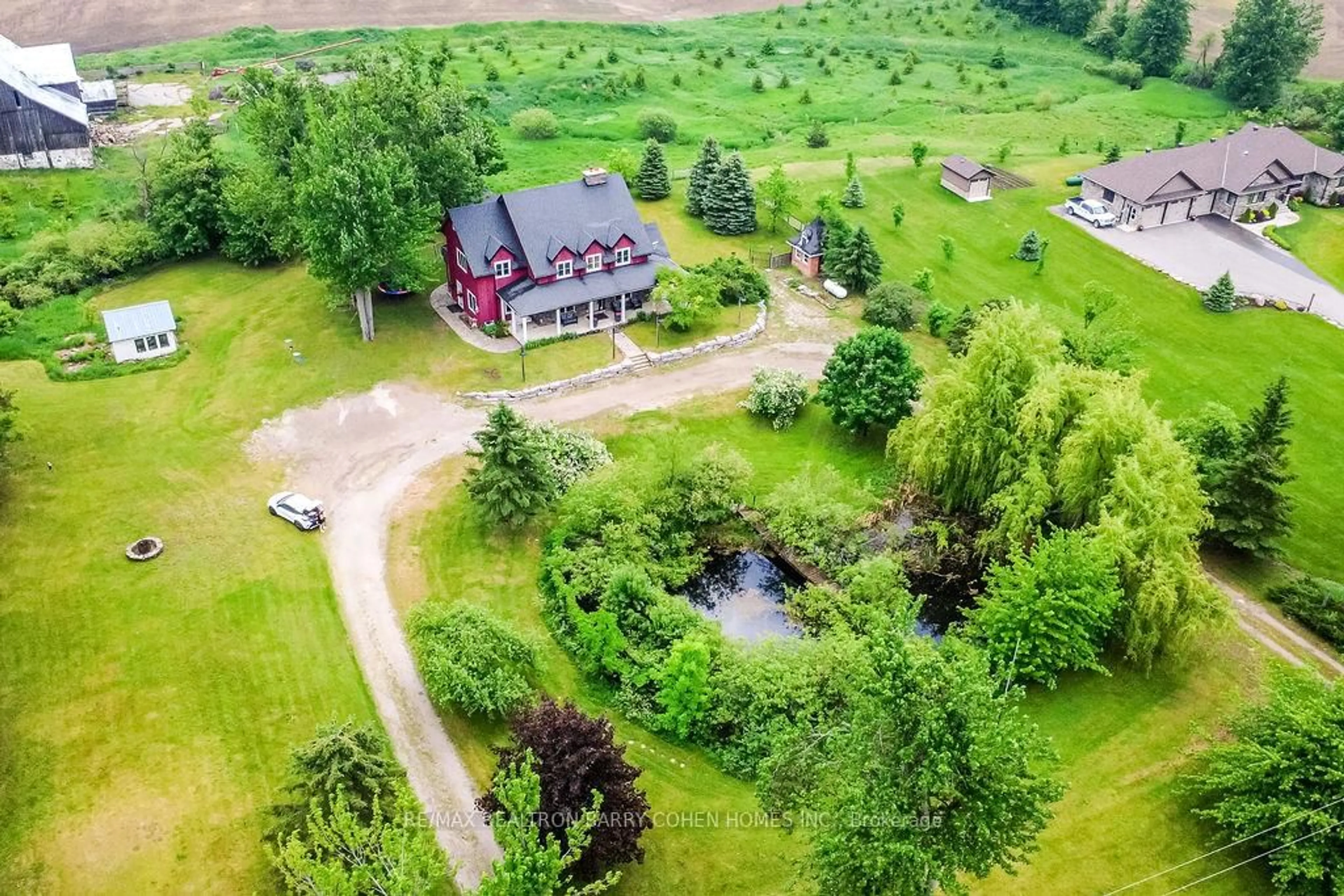 A pic from outside/outdoor area/front of a property/back of a property/a pic from drone, unknown for 303 9 Line, Oro-Medonte Ontario L0L 1T0