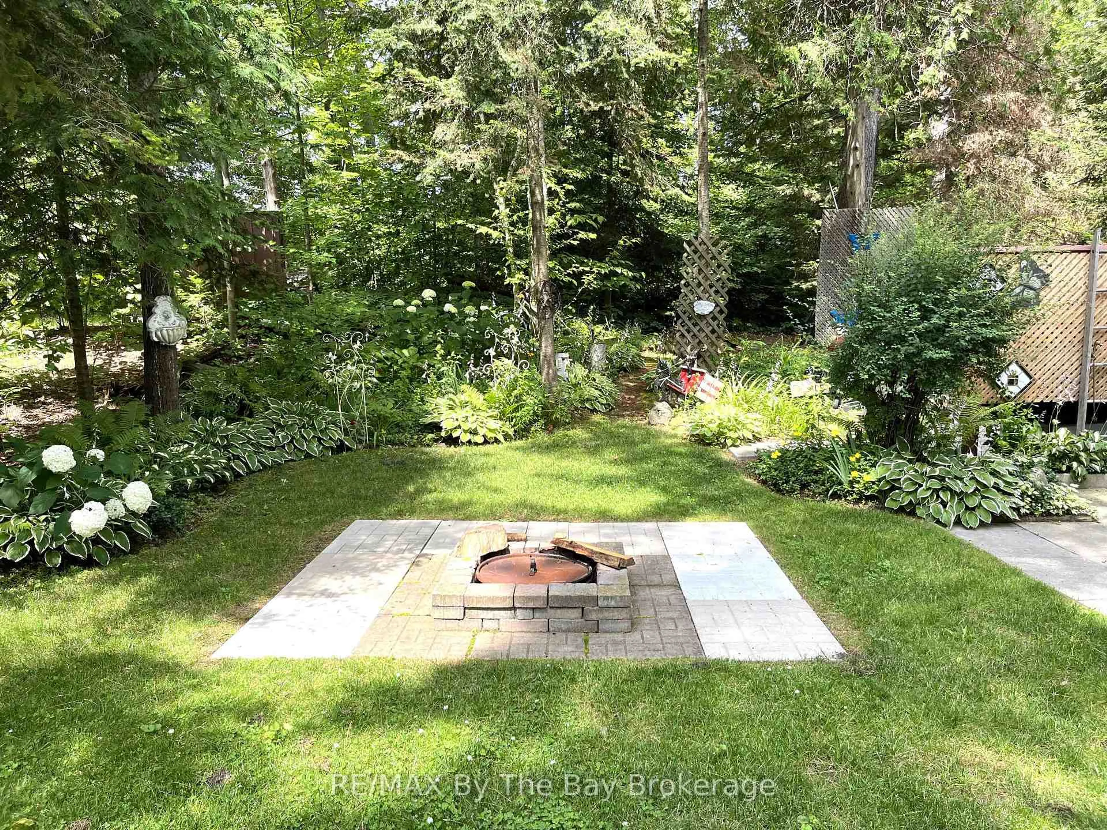 Patio, forest/trees view for 85 Theme Park Dr #247, Wasaga Beach Ontario L9Z 1X7