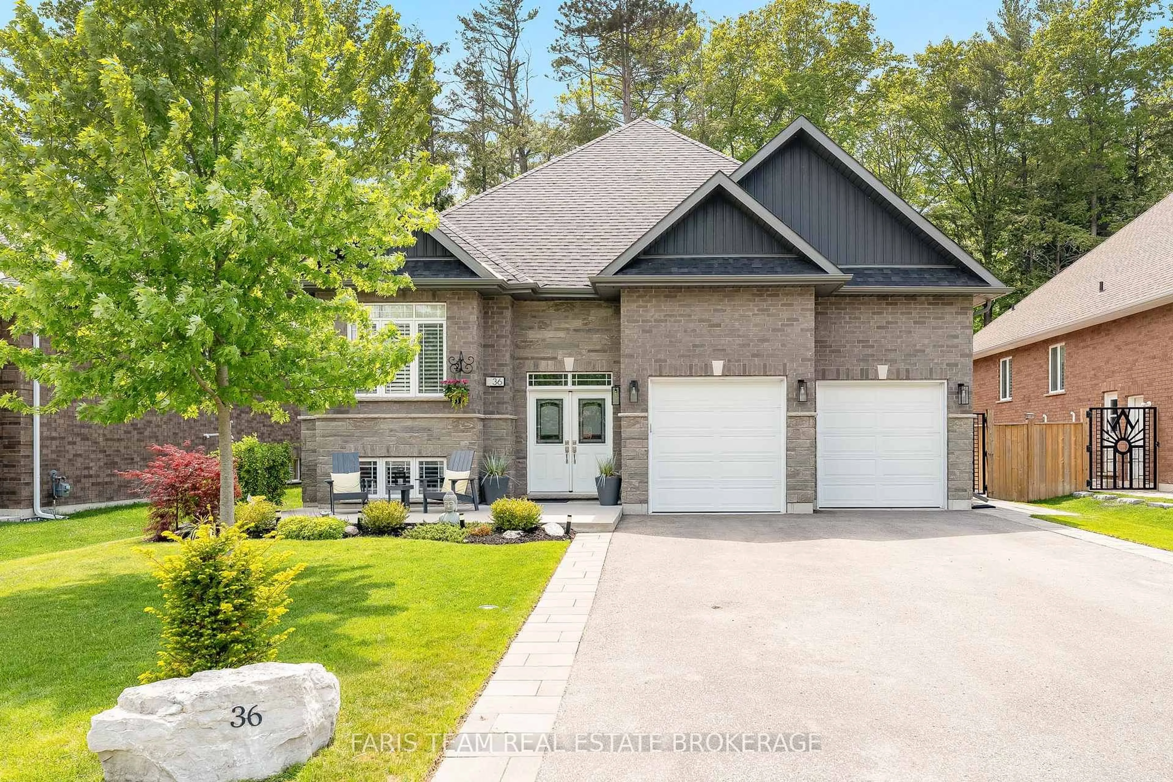 Home with brick exterior material, street for 36 Natures Tr, Wasaga Beach Ontario L9Z 0H4