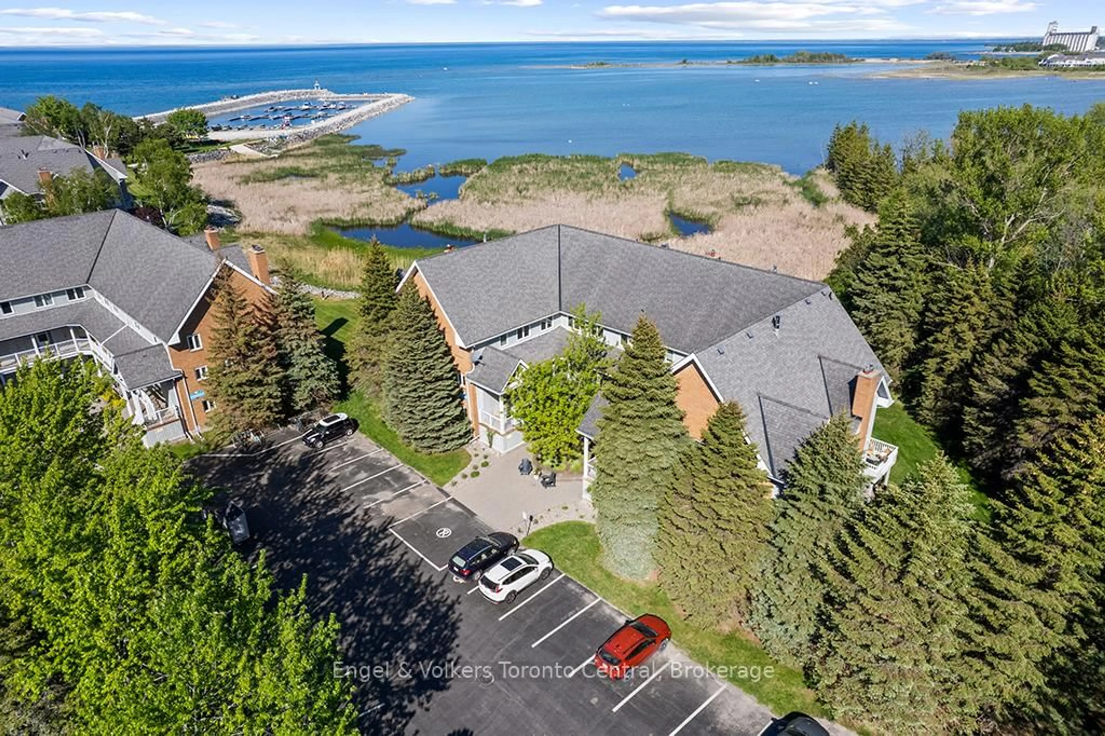 A pic from outside/outdoor area/front of a property/back of a property/a pic from drone, water/lake/river/ocean view for 2 Ramblings Way #8, Collingwood Ontario L9Y 5C6