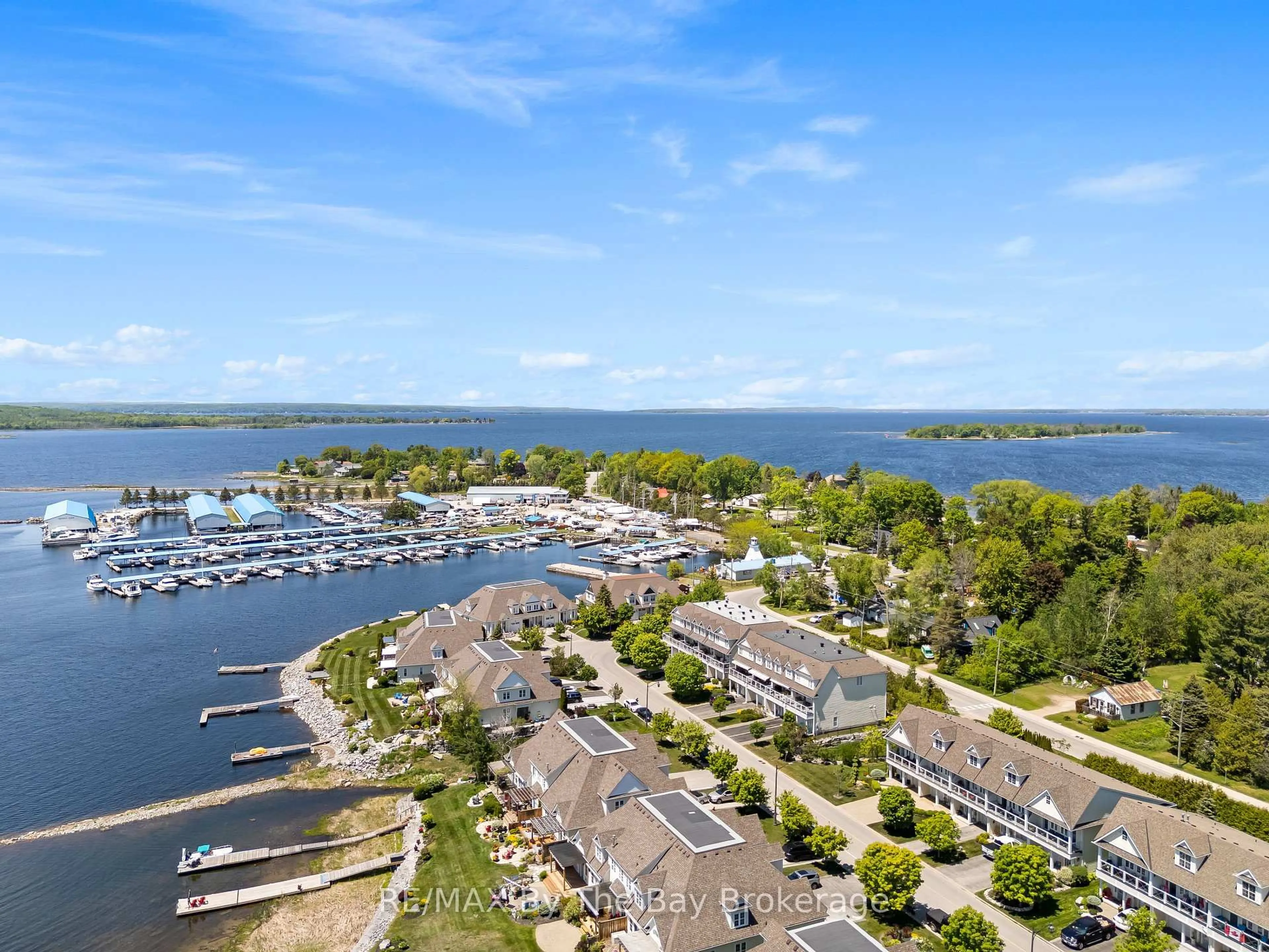 A pic from outside/outdoor area/front of a property/back of a property/a pic from drone, water/lake/river/ocean view for 127 Wycliffe Cove, Tay Ontario L0K 2A0