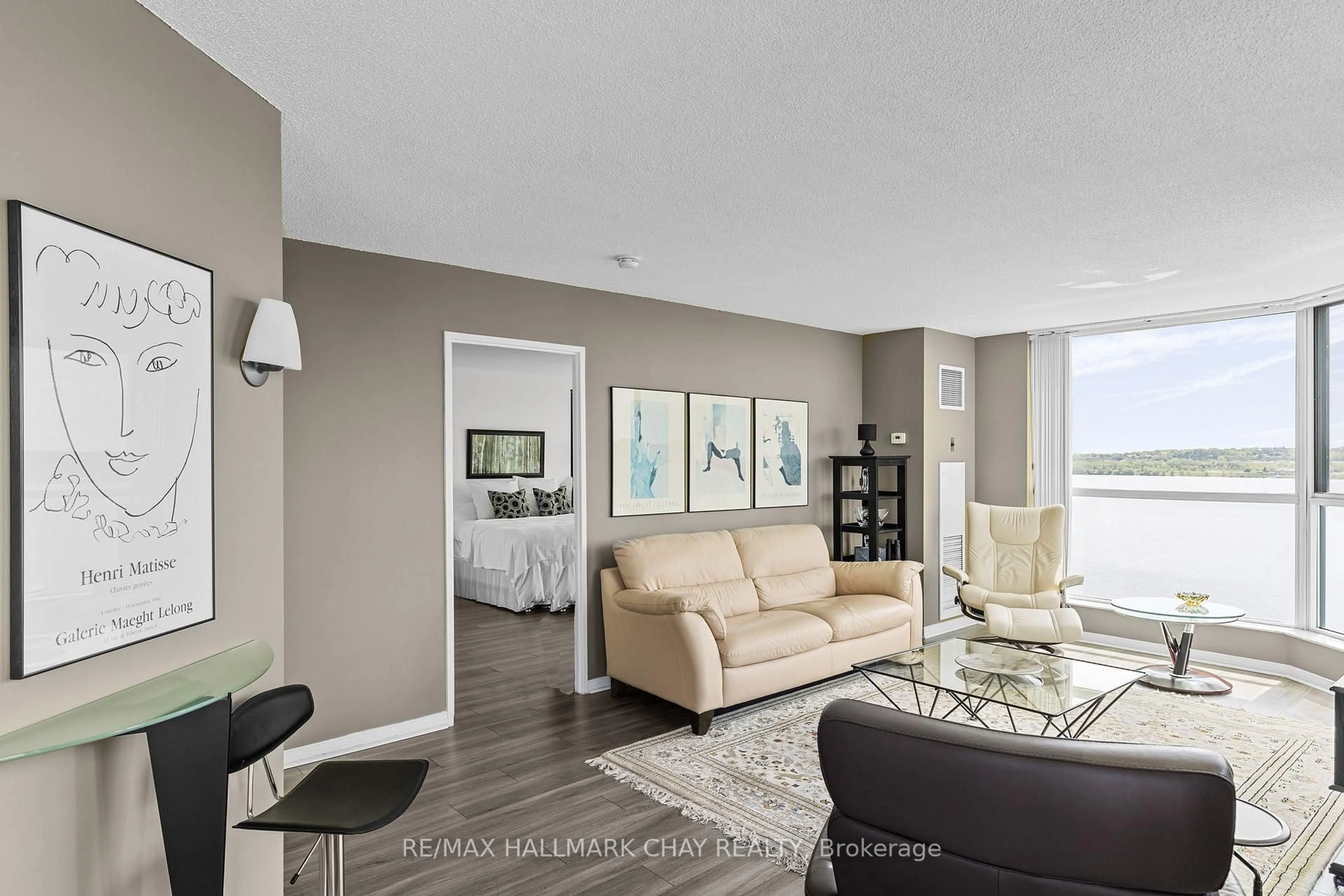 Living room with furniture, unknown for 140 Dunlop St #906, Barrie Ontario L4M 6H9
