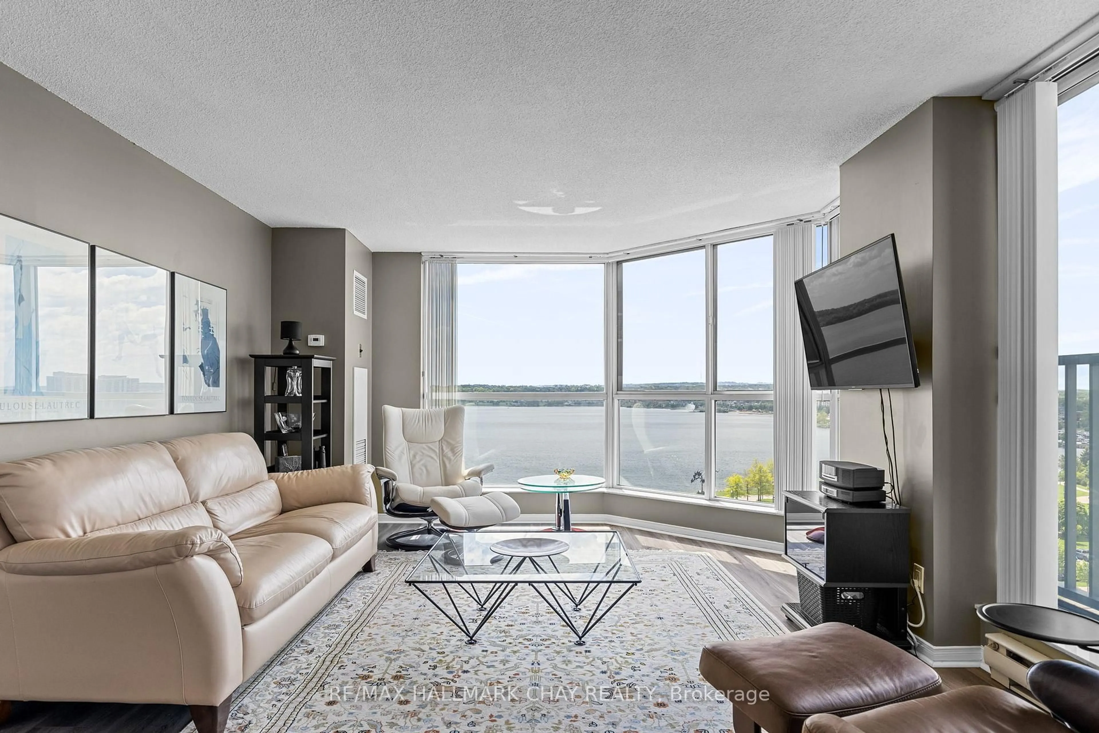 Living room with furniture, unknown for 140 Dunlop St #906, Barrie Ontario L4M 6H9