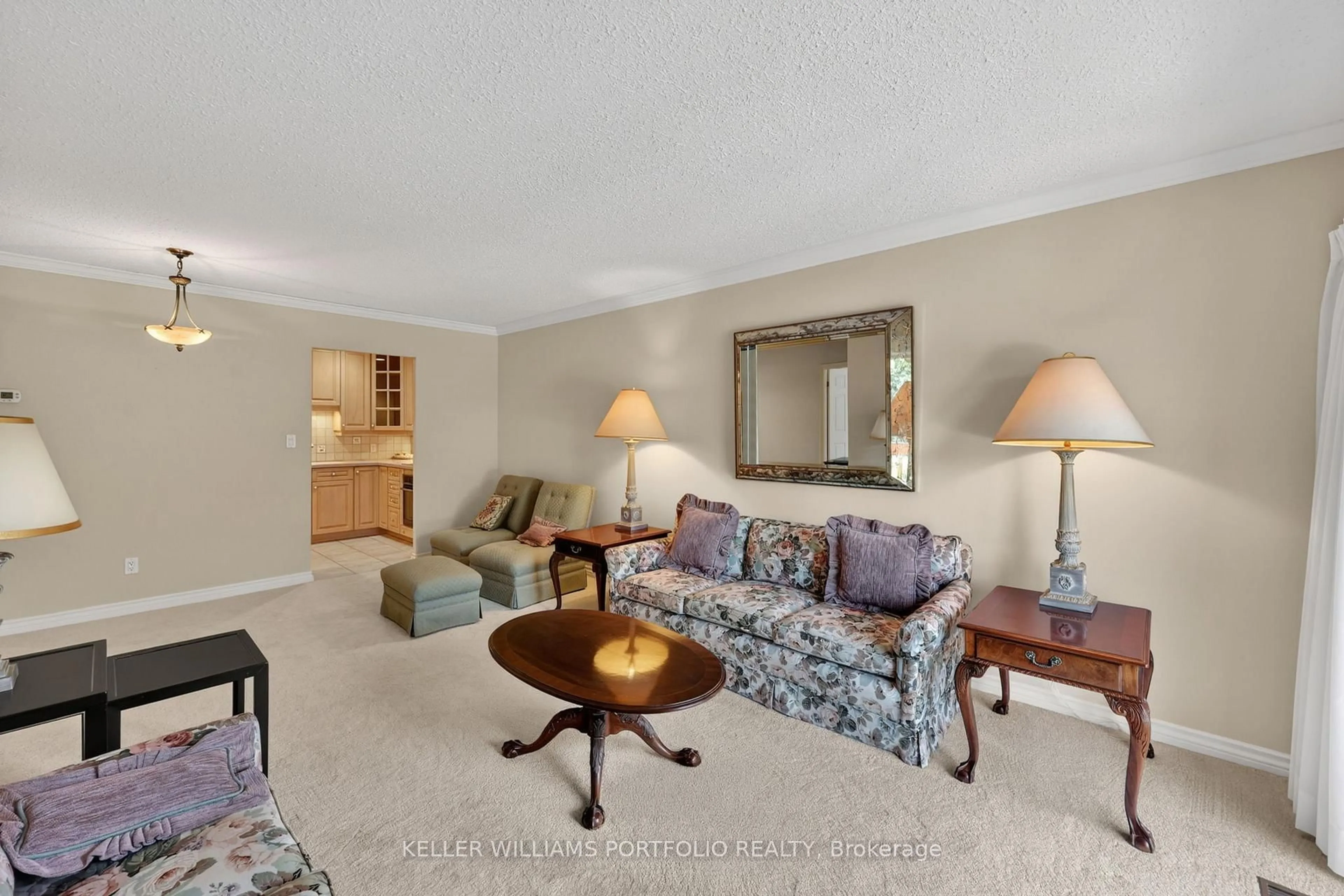 Living room with furniture, carpet floor for 696 King St #36, Midland Ontario L4R 5B6