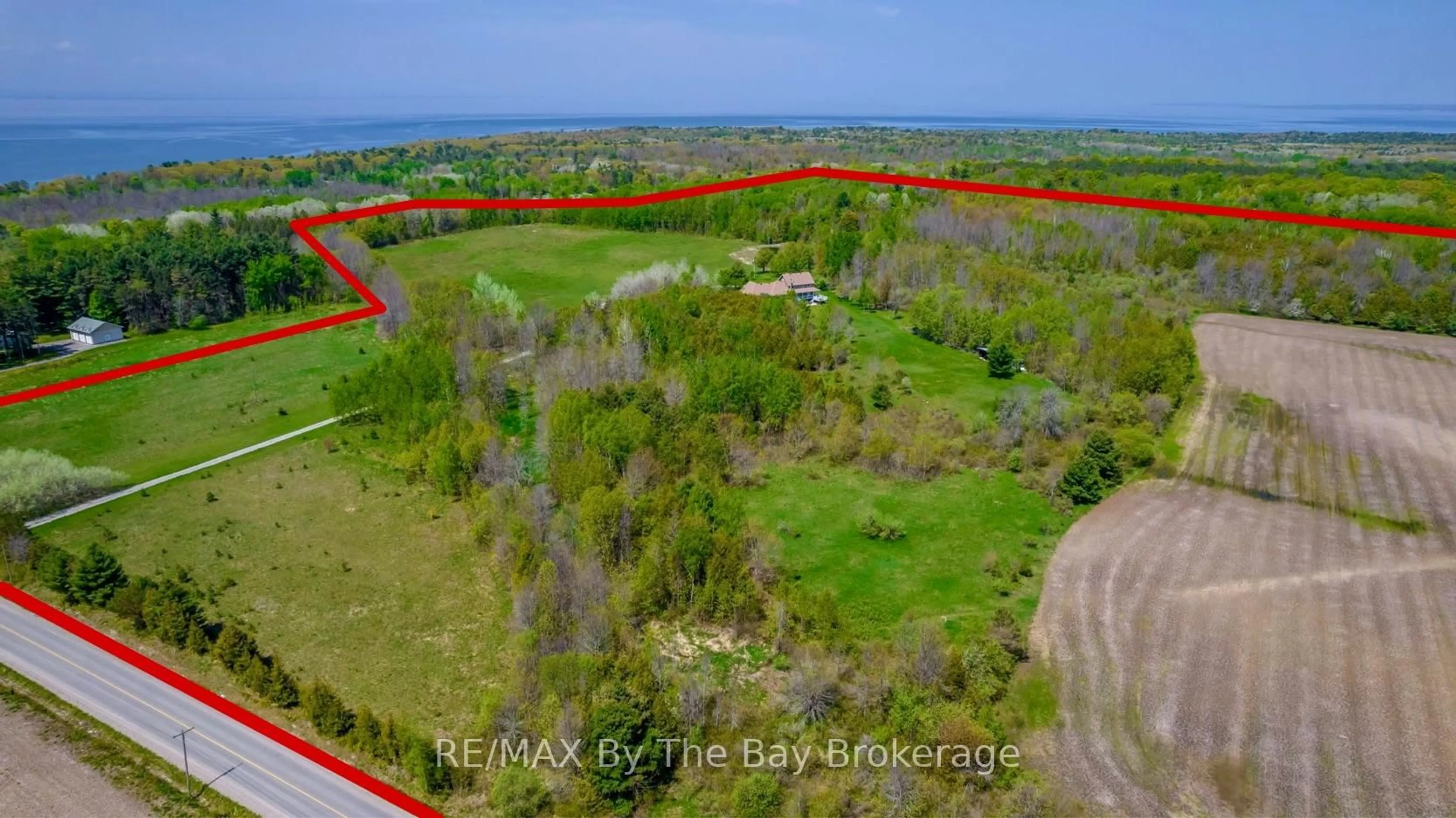 A pic from outside/outdoor area/front of a property/back of a property/a pic from drone, water/lake/river/ocean view for 960 Lawson Rd, Tiny Ontario L0L 1P1