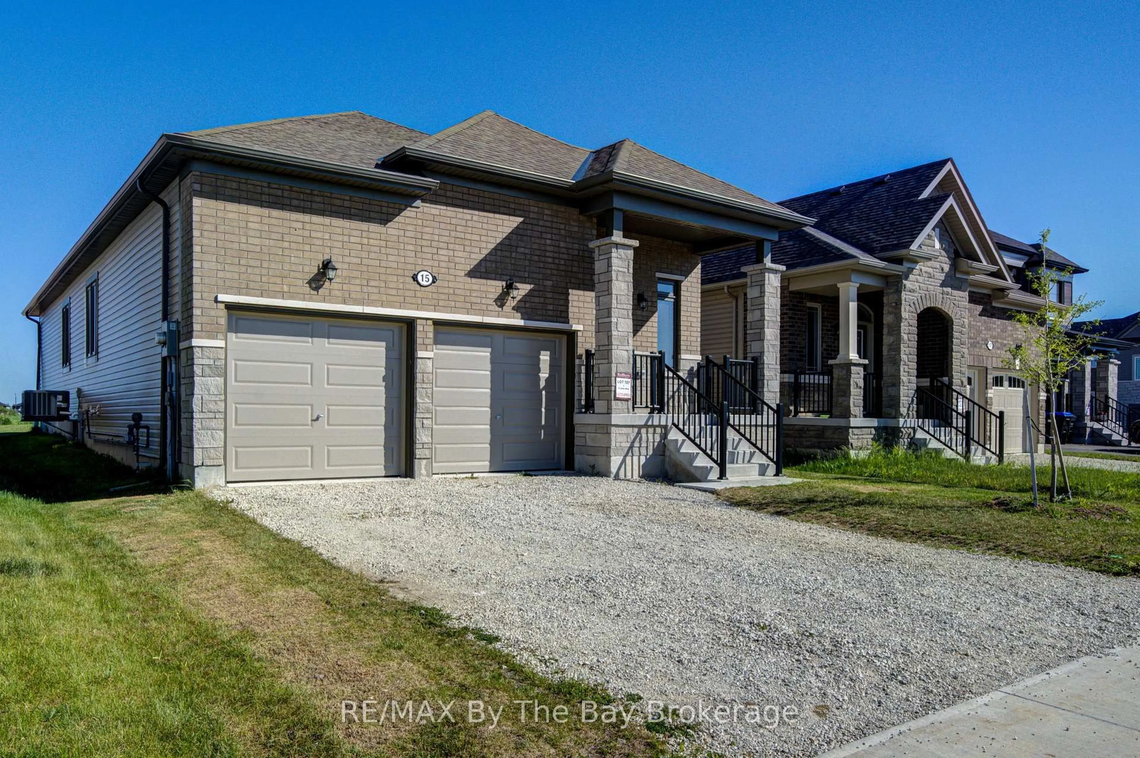 Home with brick exterior material, street for 15 Union Blvd, Wasaga Beach Ontario L9Z 0M6