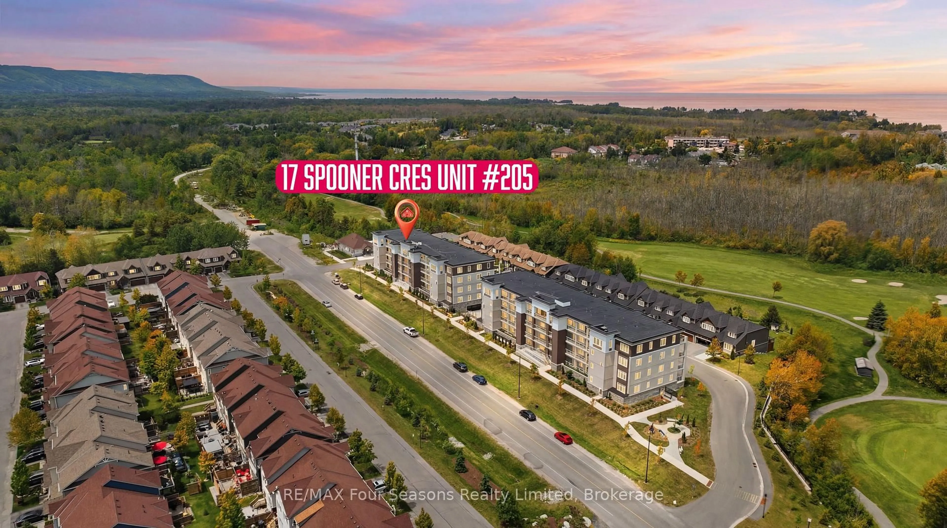 A pic from outside/outdoor area/front of a property/back of a property/a pic from drone, street for 17 Spooner Cres #205, Collingwood Ontario L9Y 1T3