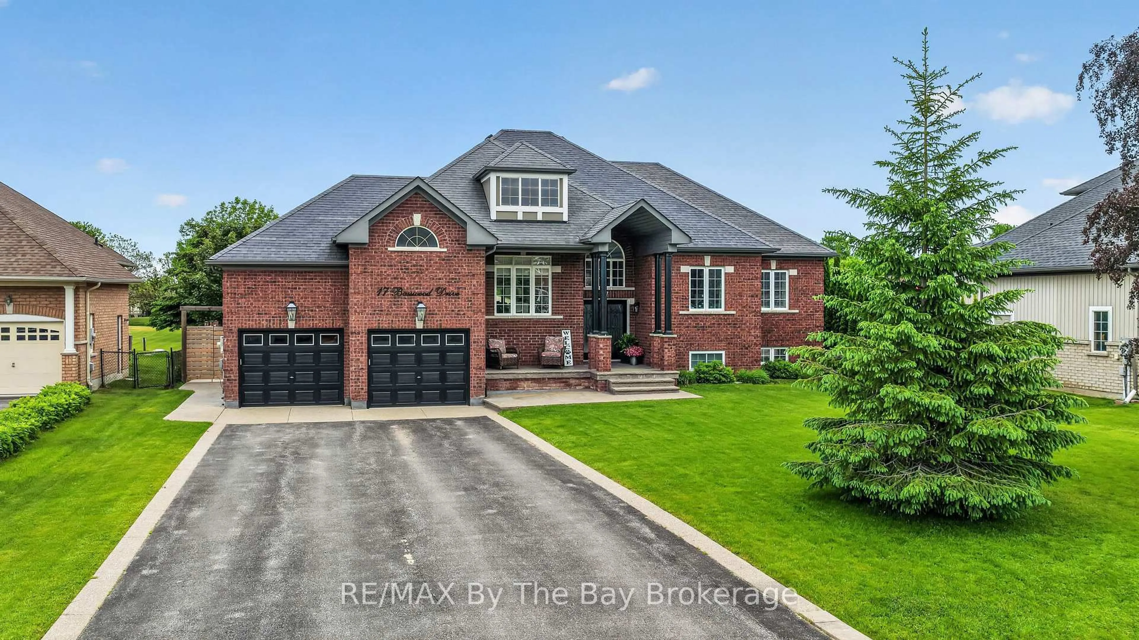 Home with brick exterior material, street for 17 Basswood Dr, Wasaga Beach Ontario L9Z 0A8