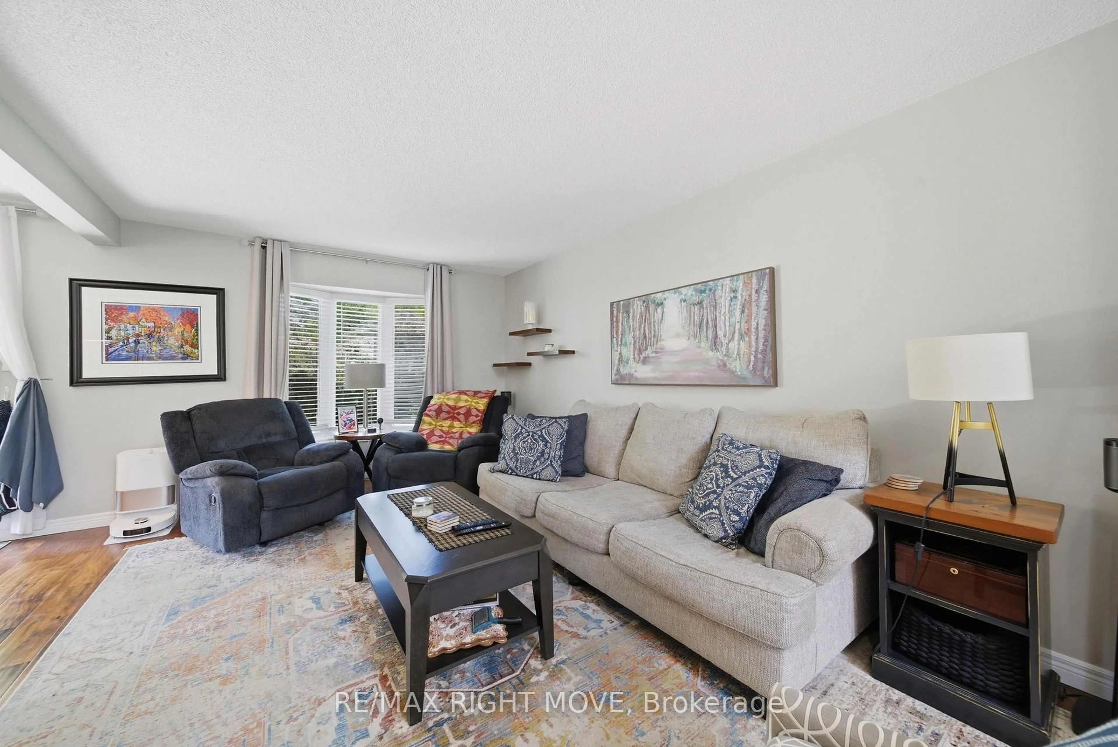 Living room with furniture, unknown for 300 Cundles Rd, Barrie Ontario L4N 7C9