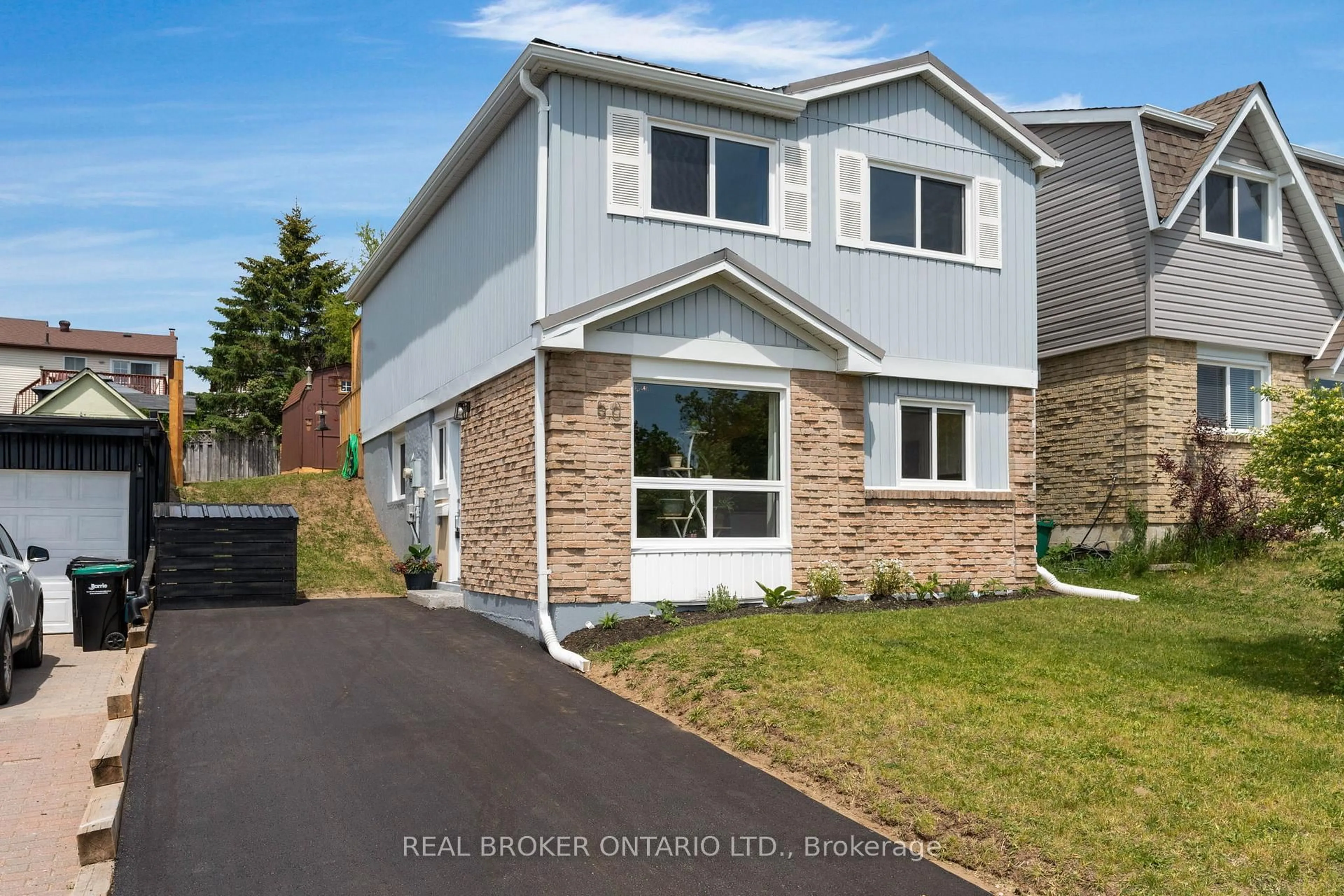 Home with brick exterior material, street for 50 Browning Tr, Barrie Ontario L4N 4Z5