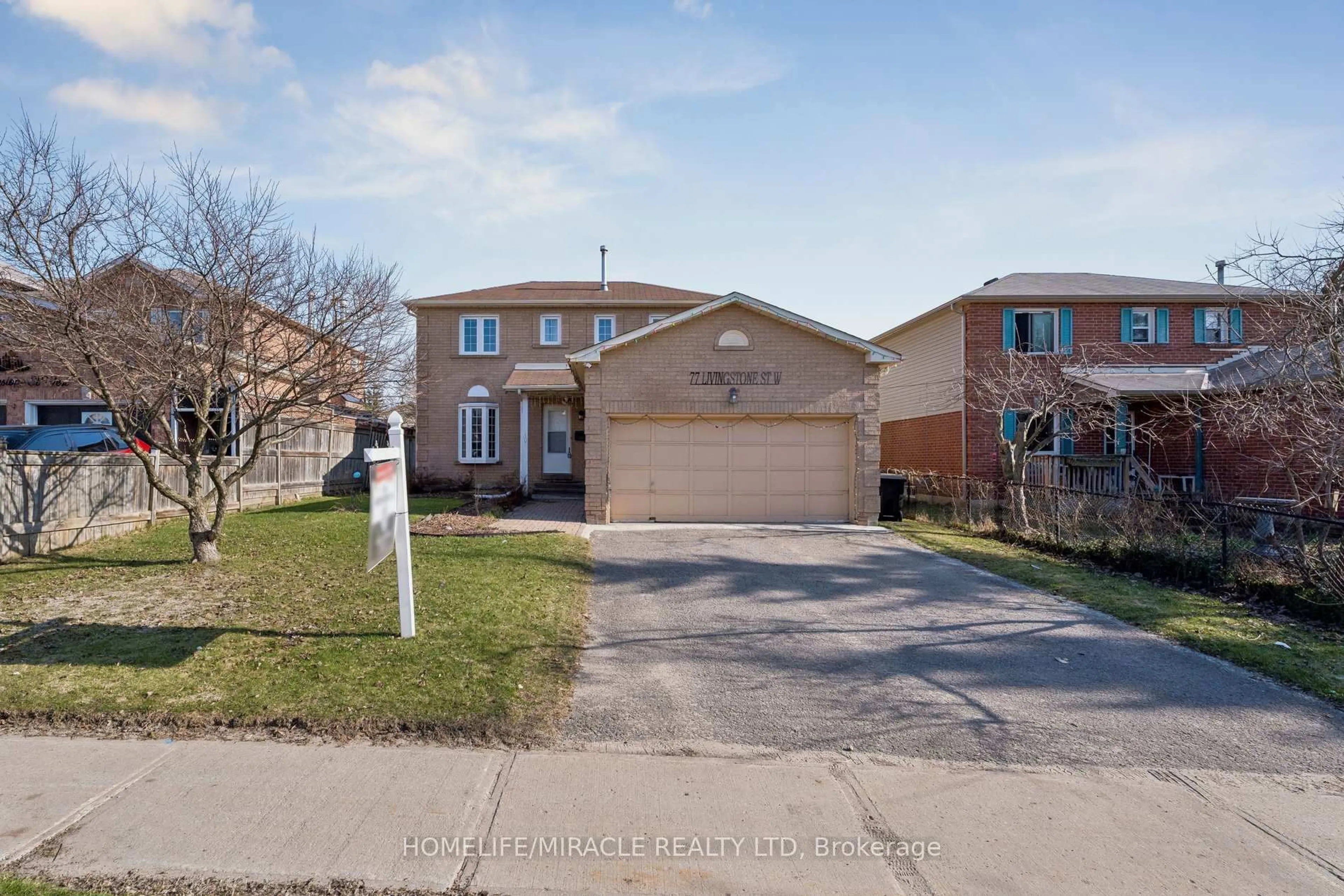 Home with brick exterior material, street for 77 Livingstone St, Barrie Ontario L4N 7J1