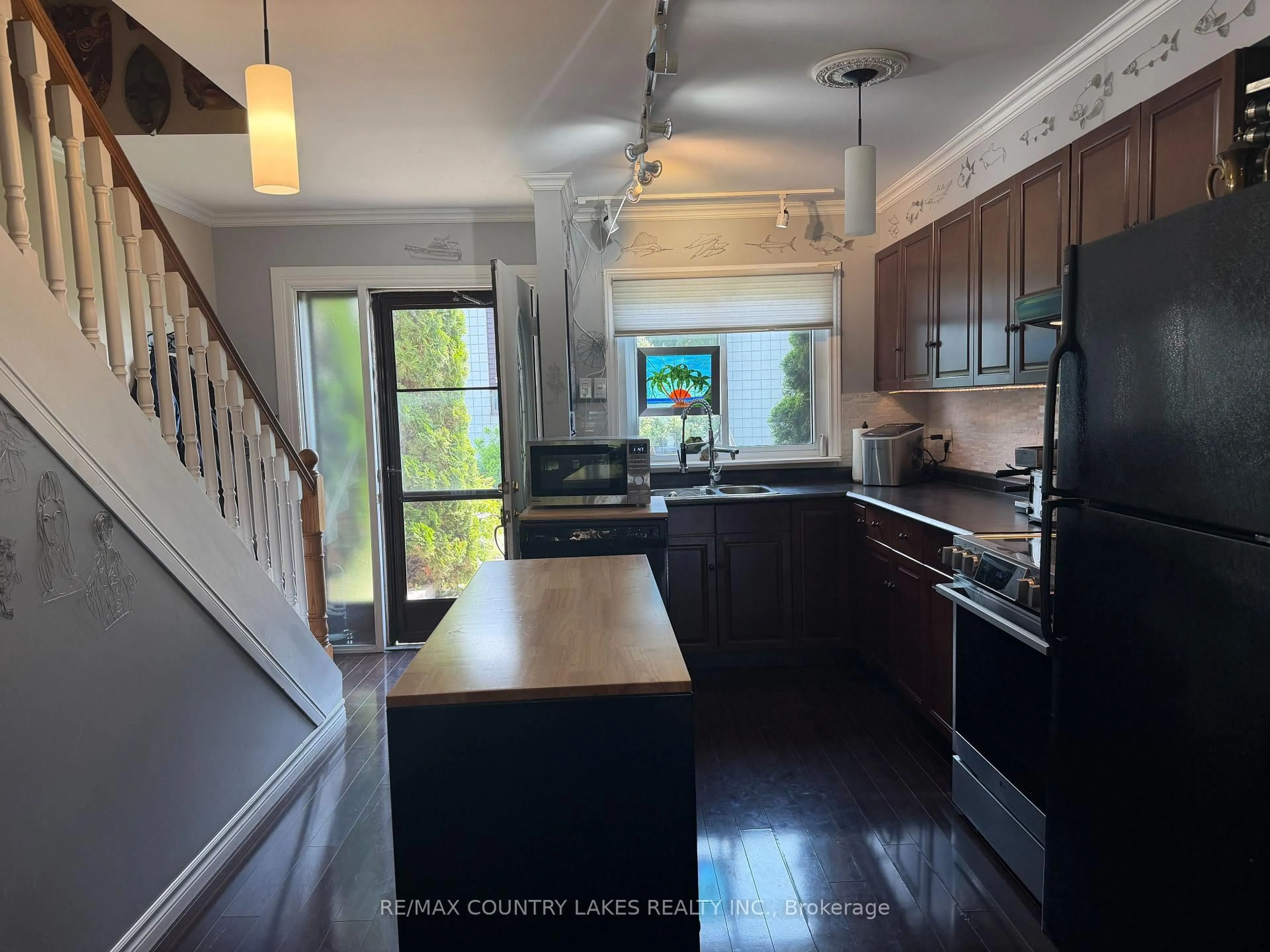 Open concept kitchen, wood/laminate floor for 1 Paradise Blvd #11, Ramara Ontario L0K 1B0