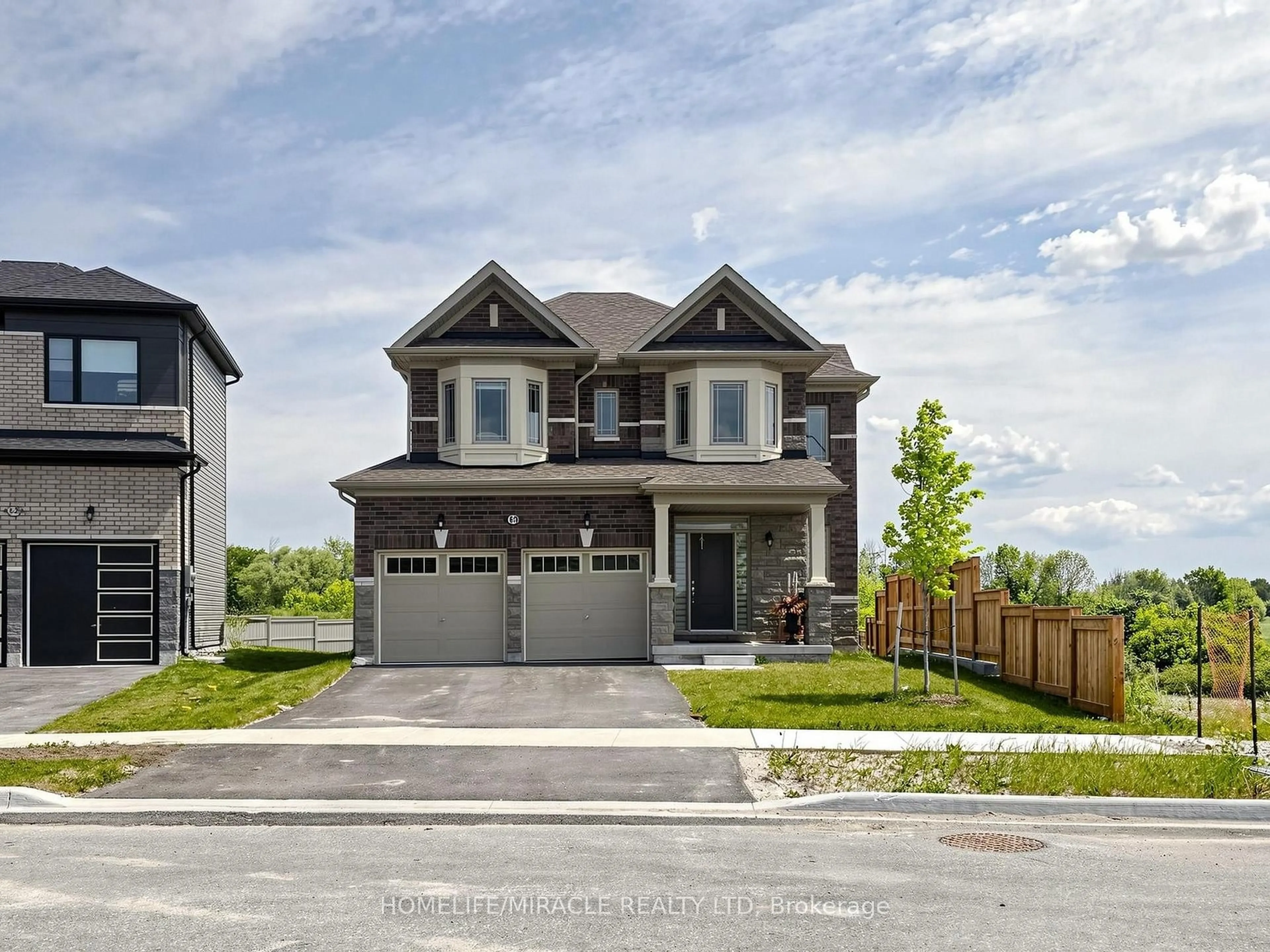 Home with brick exterior material, street for 60 Season Cres, Wasaga Beach Ontario L9Z 0M4
