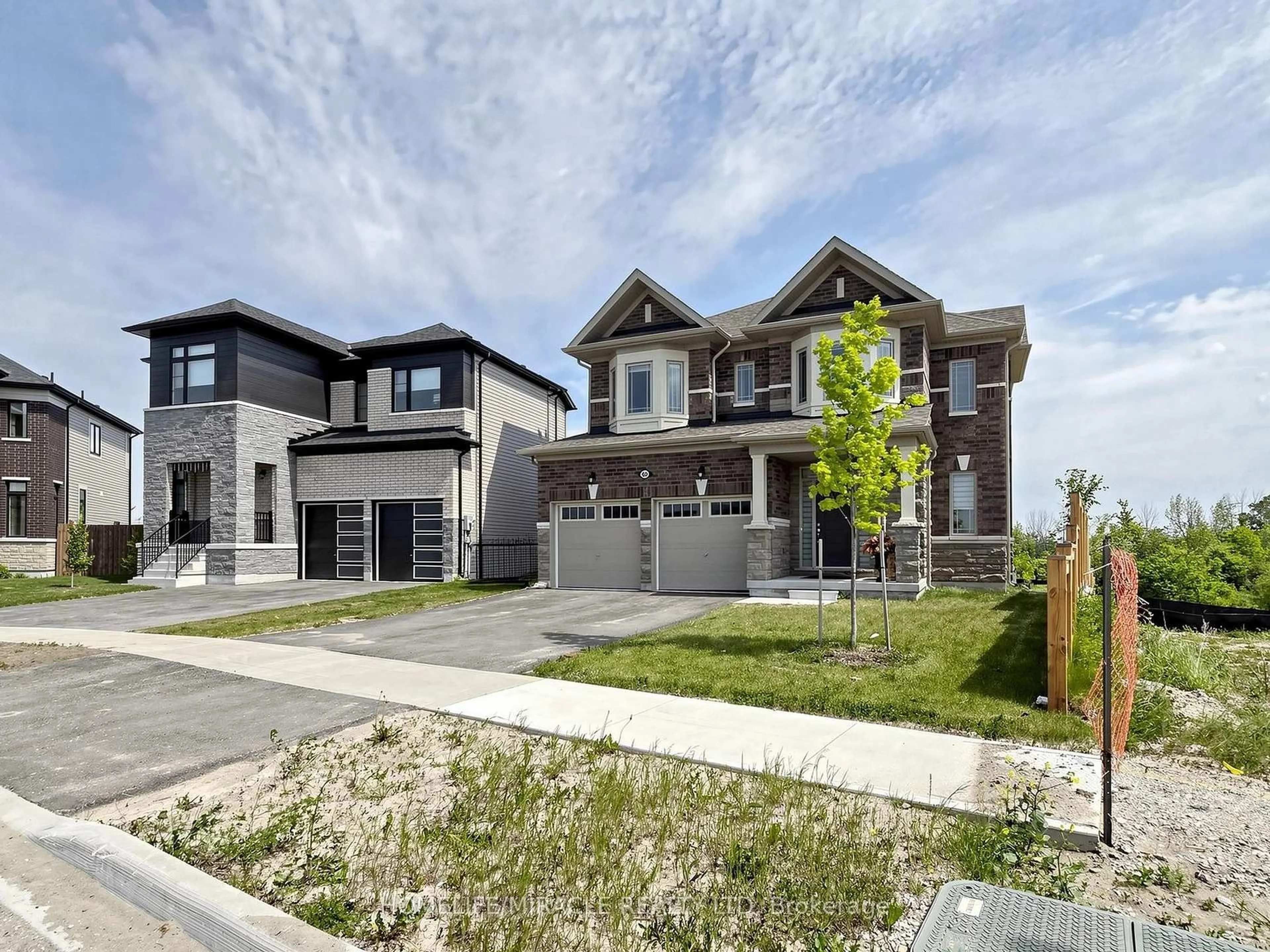 Home with brick exterior material, street for 60 Season Cres, Wasaga Beach Ontario L9Z 0M4