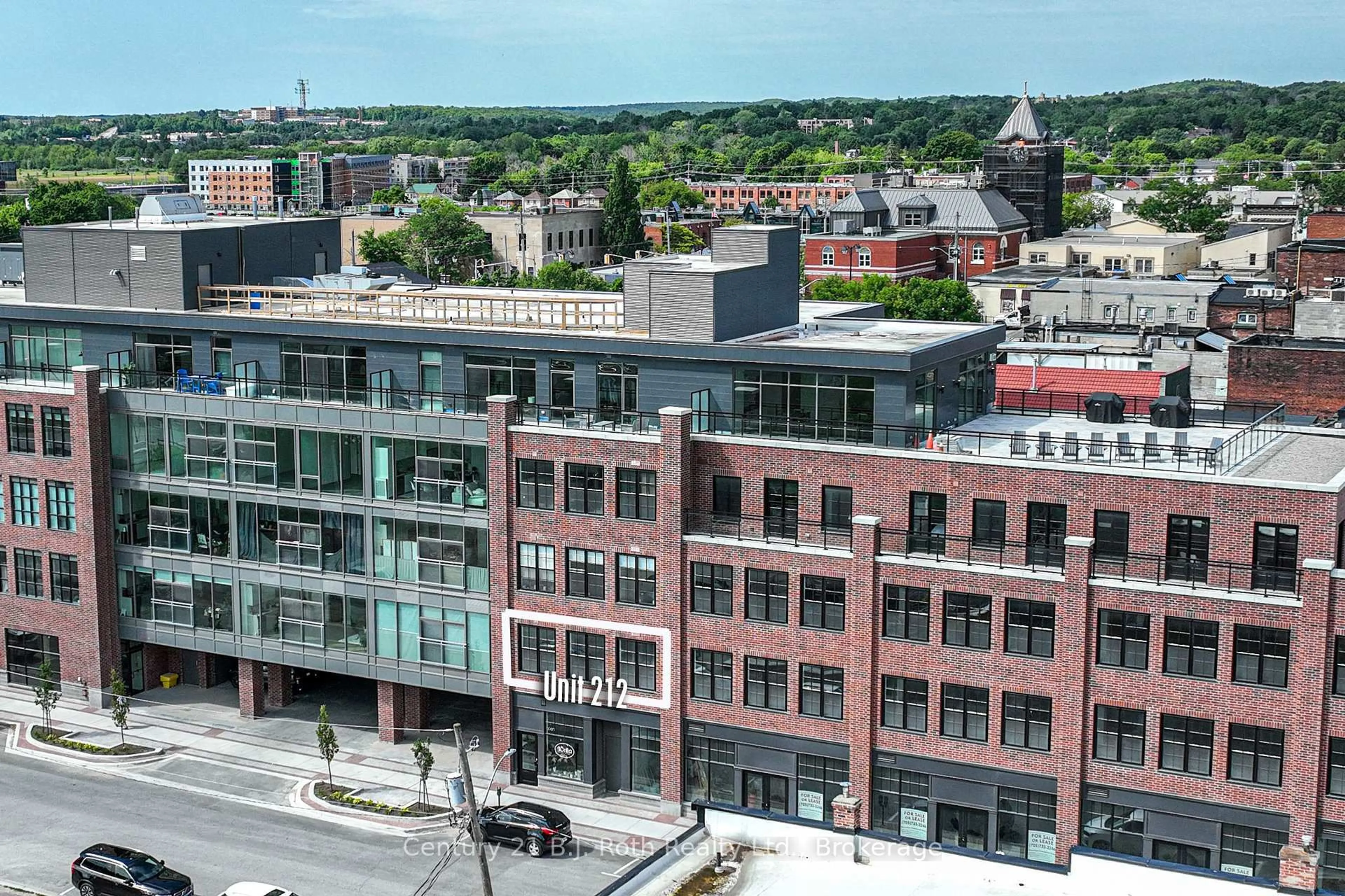 A pic from outside/outdoor area/front of a property/back of a property/a pic from drone, city buildings view from balcony for 21 MATCHEDASH St #212, Orillia Ontario L3V 4W4