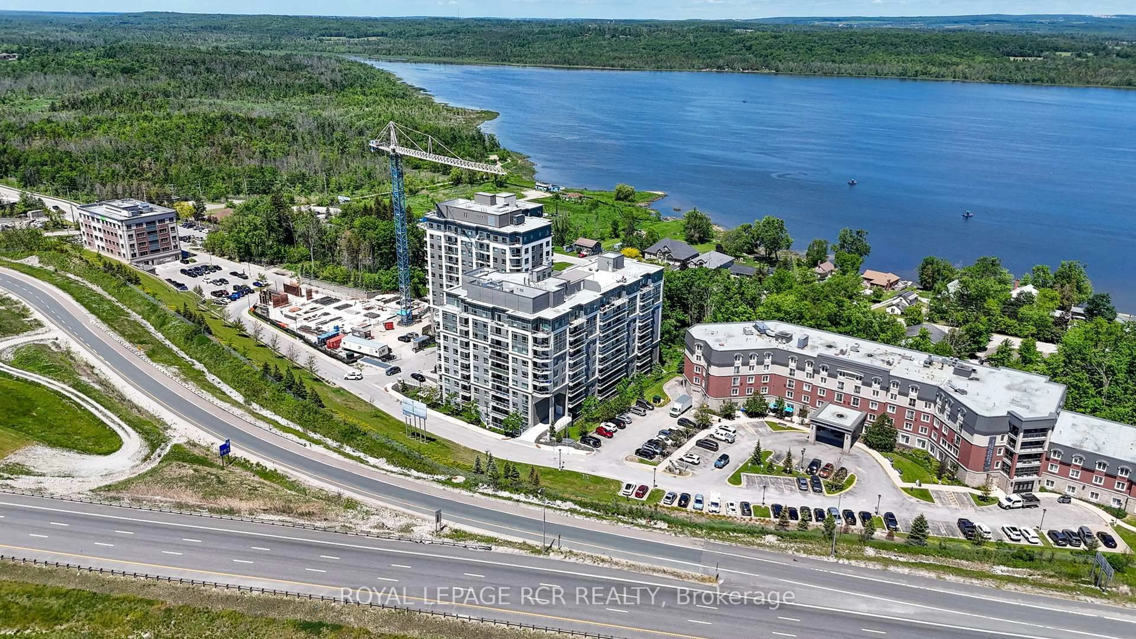 A pic from outside/outdoor area/front of a property/back of a property/a pic from drone, water/lake/river/ocean view for 58 Lakeside Terr #808, Barrie Ontario L4M 0L5
