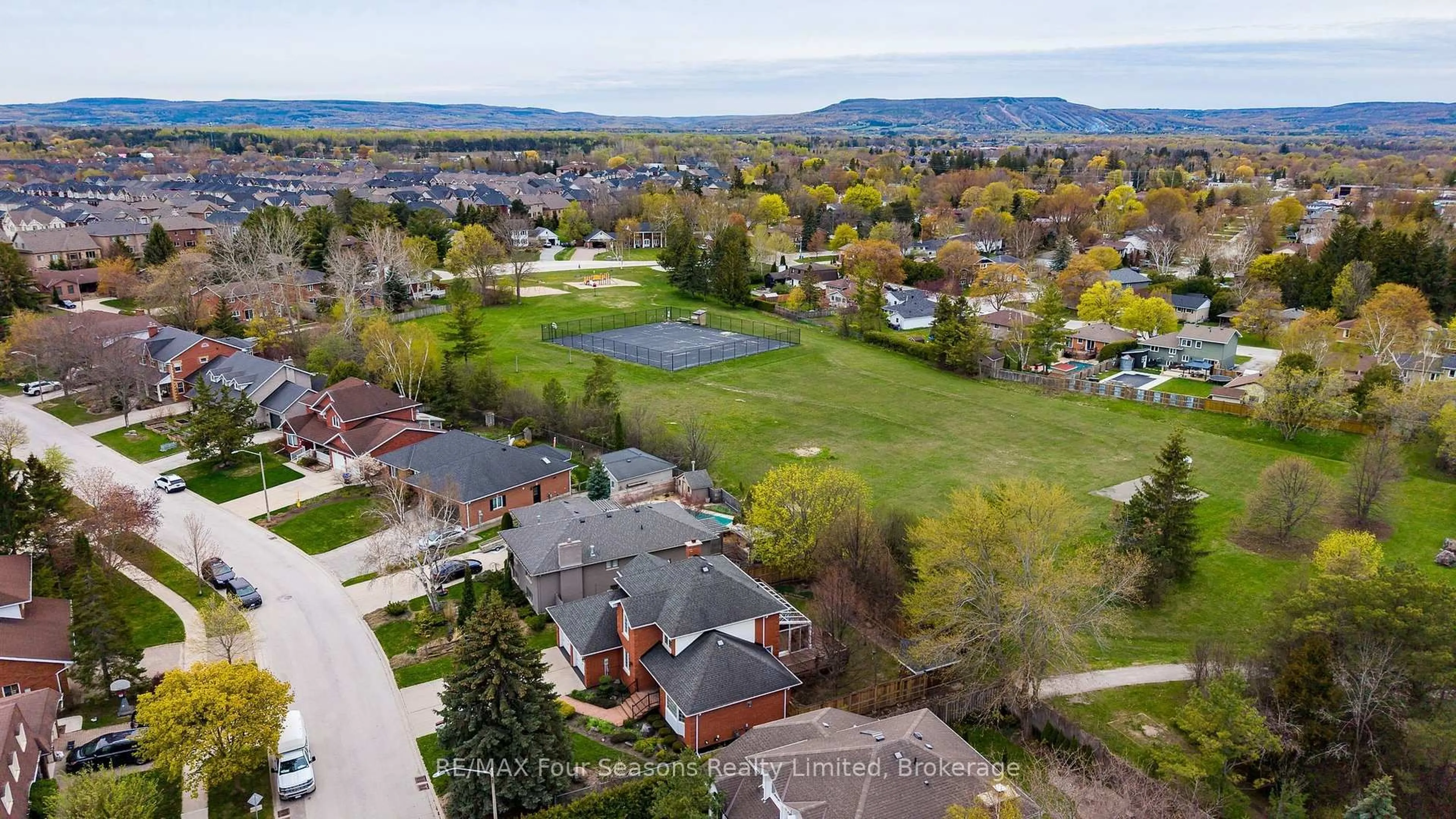 A pic from outside/outdoor area/front of a property/back of a property/a pic from drone, mountain view for 16 Carmichael Cres, Collingwood Ontario L9Y 4R6
