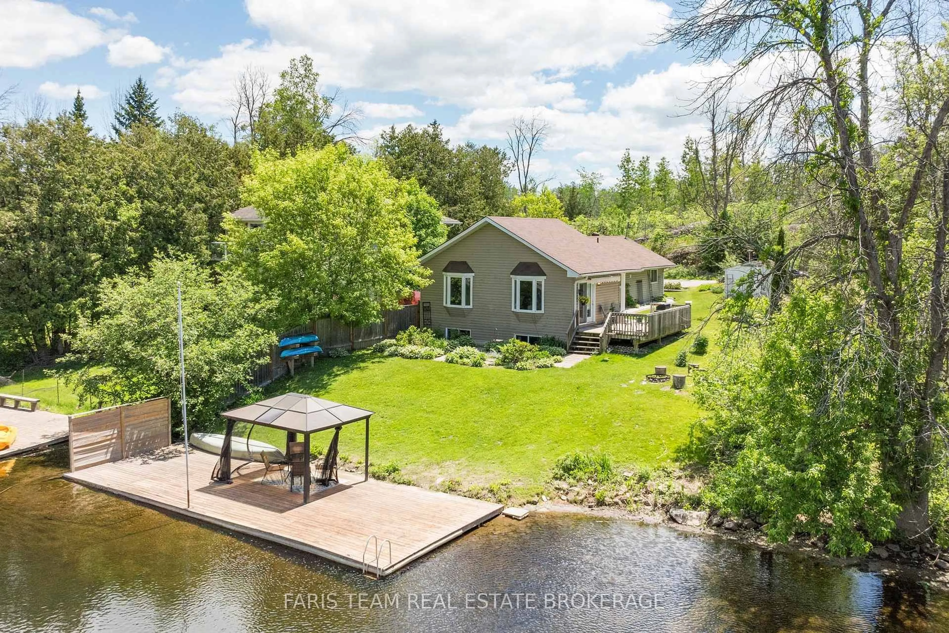 A pic from outside/outdoor area/front of a property/back of a property/a pic from drone, water/lake/river/ocean view for 4654 Iron Bridge Lane, Severn Ontario P0E 1N0