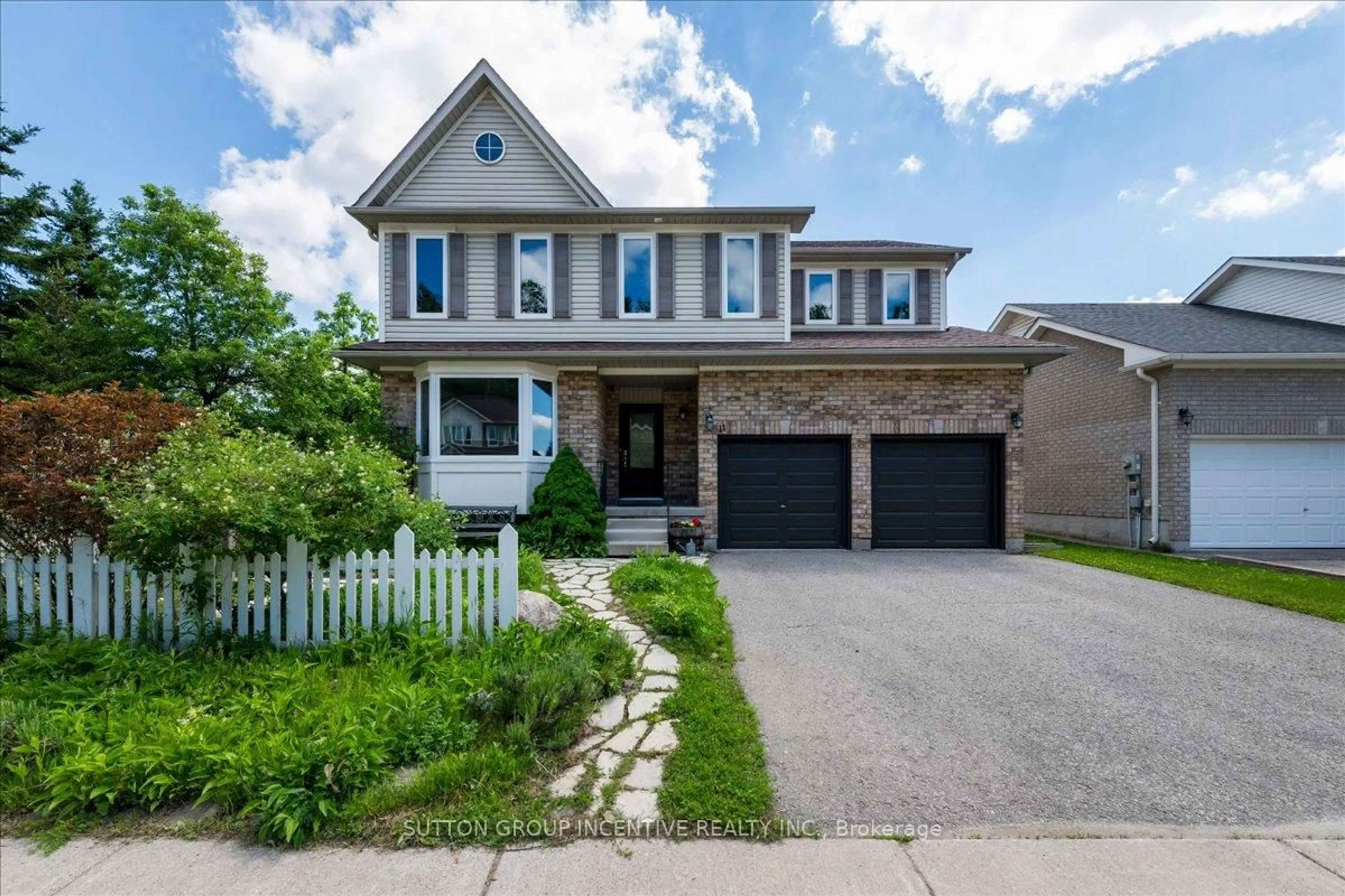 Home with brick exterior material, street for 11 Thrushwood Dr, Barrie Ontario L4N 0Z1