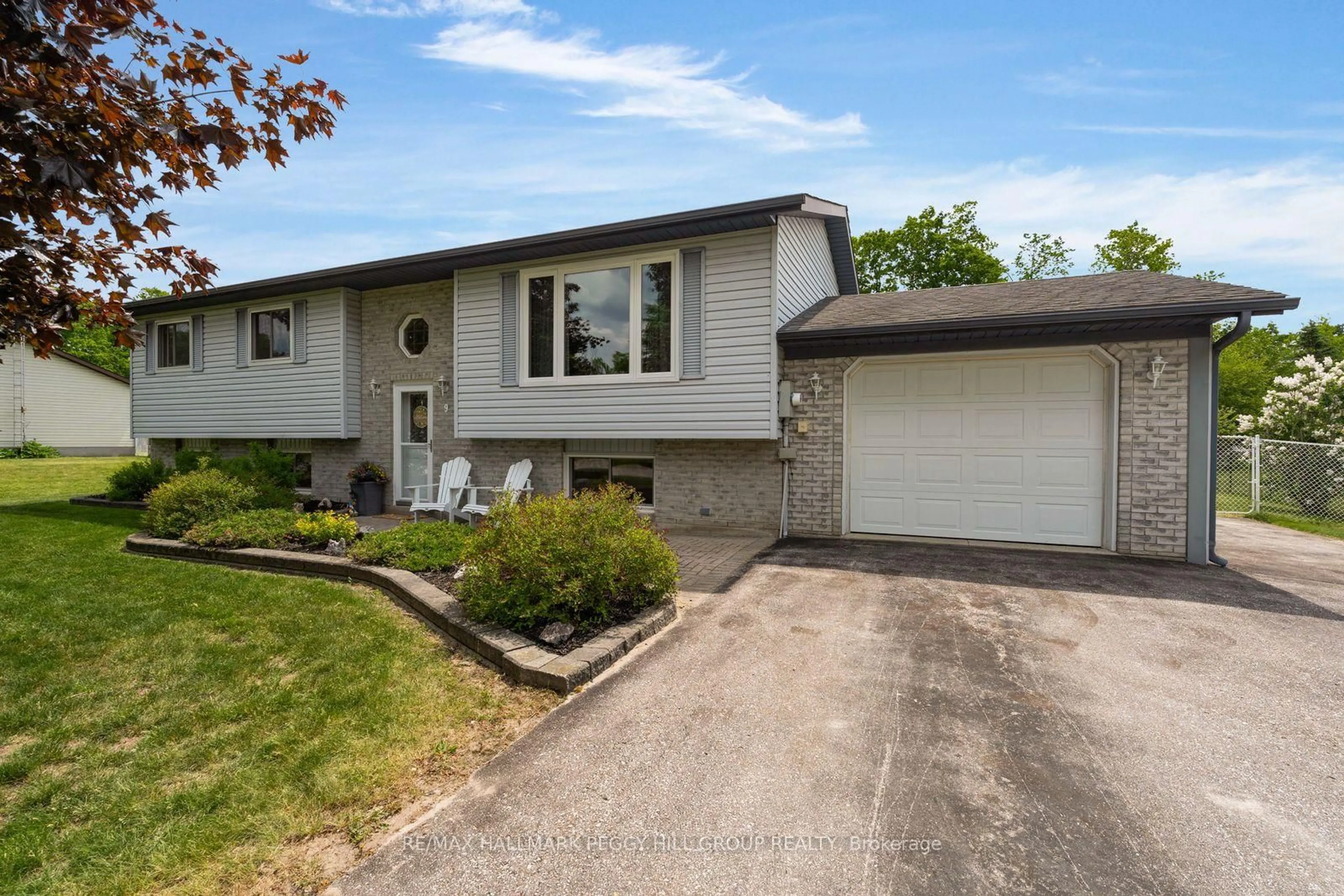 Home with vinyl exterior material, street for 9 Adams Ave, Springwater Ontario L9X 0A1