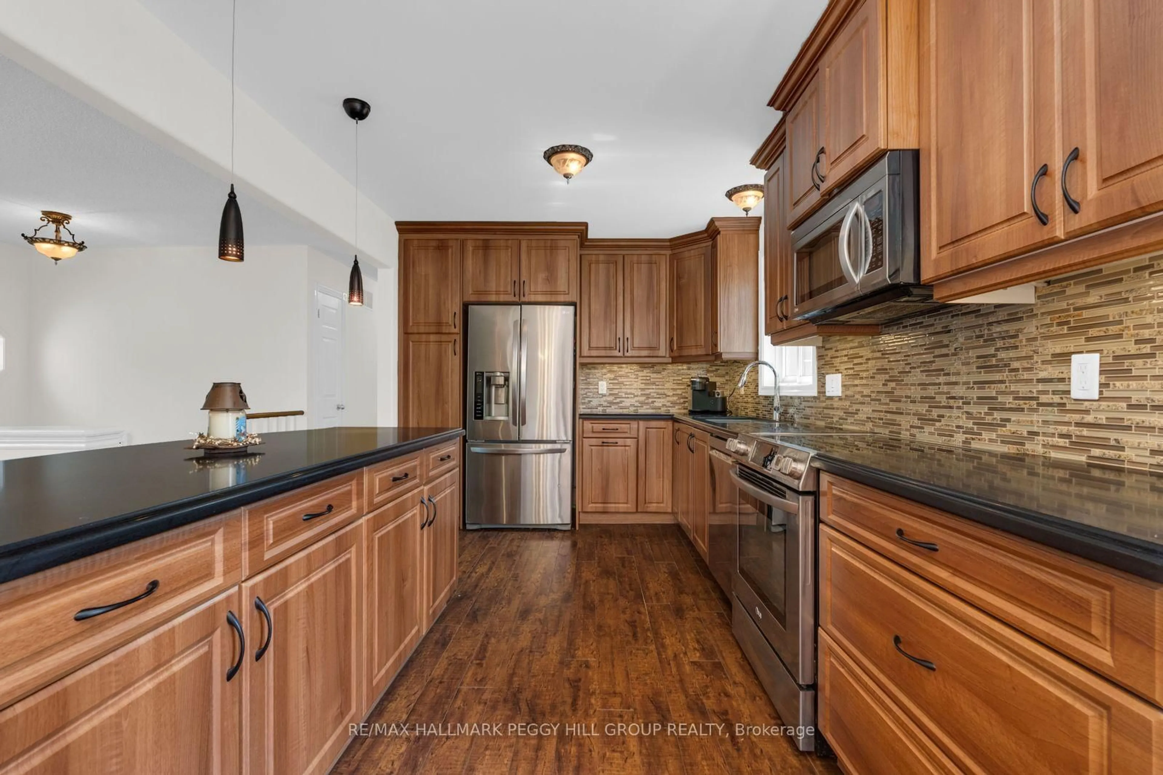 Open concept kitchen, unknown for 9 Adams Ave, Springwater Ontario L9X 0A1