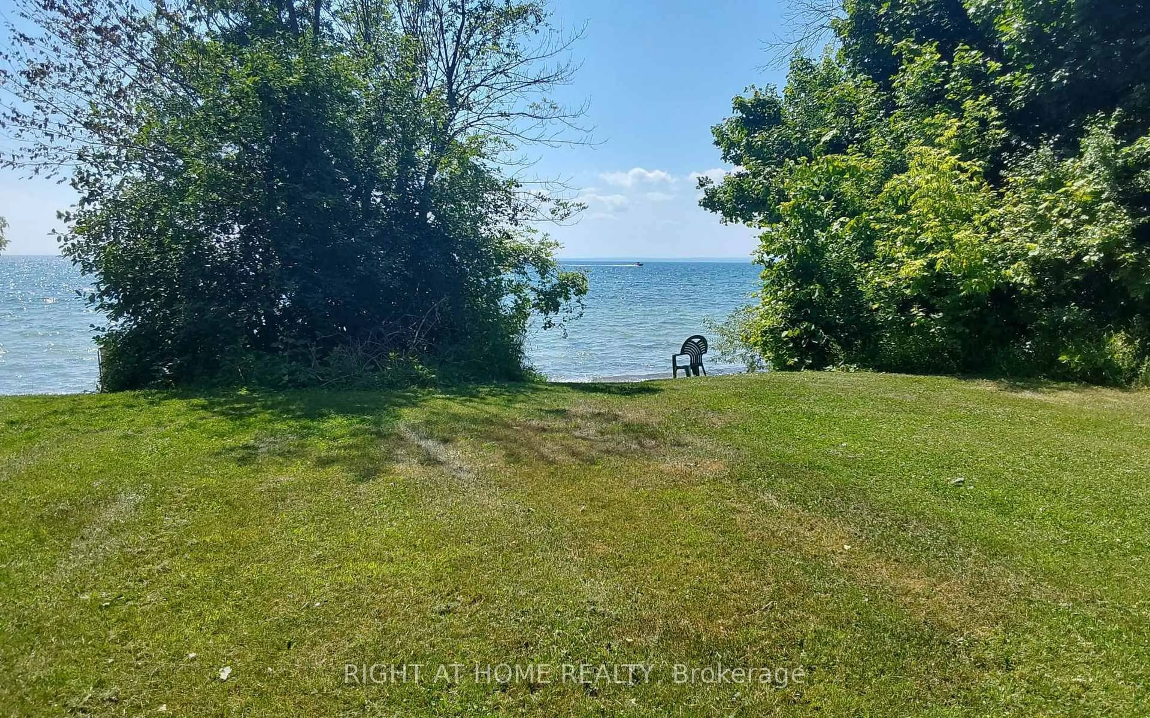 A pic from outside/outdoor area/front of a property/back of a property/a pic from drone, water/lake/river/ocean view for 2323 Lakeshore Dr, Ramara Ontario L0K 1B0