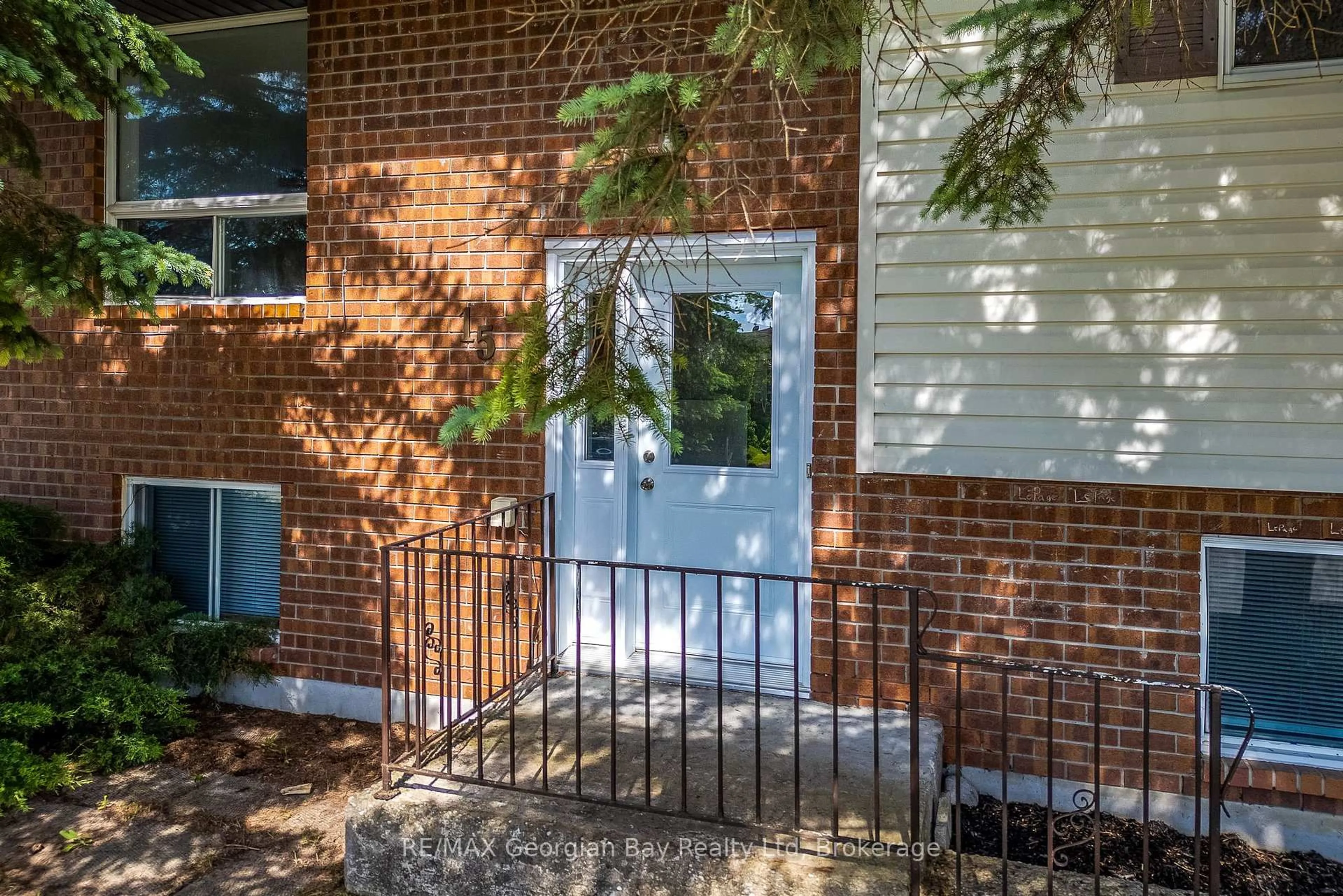 Home with brick exterior material, street for 15 Mcguire Rd, Penetanguishene Ontario L9M 1C9