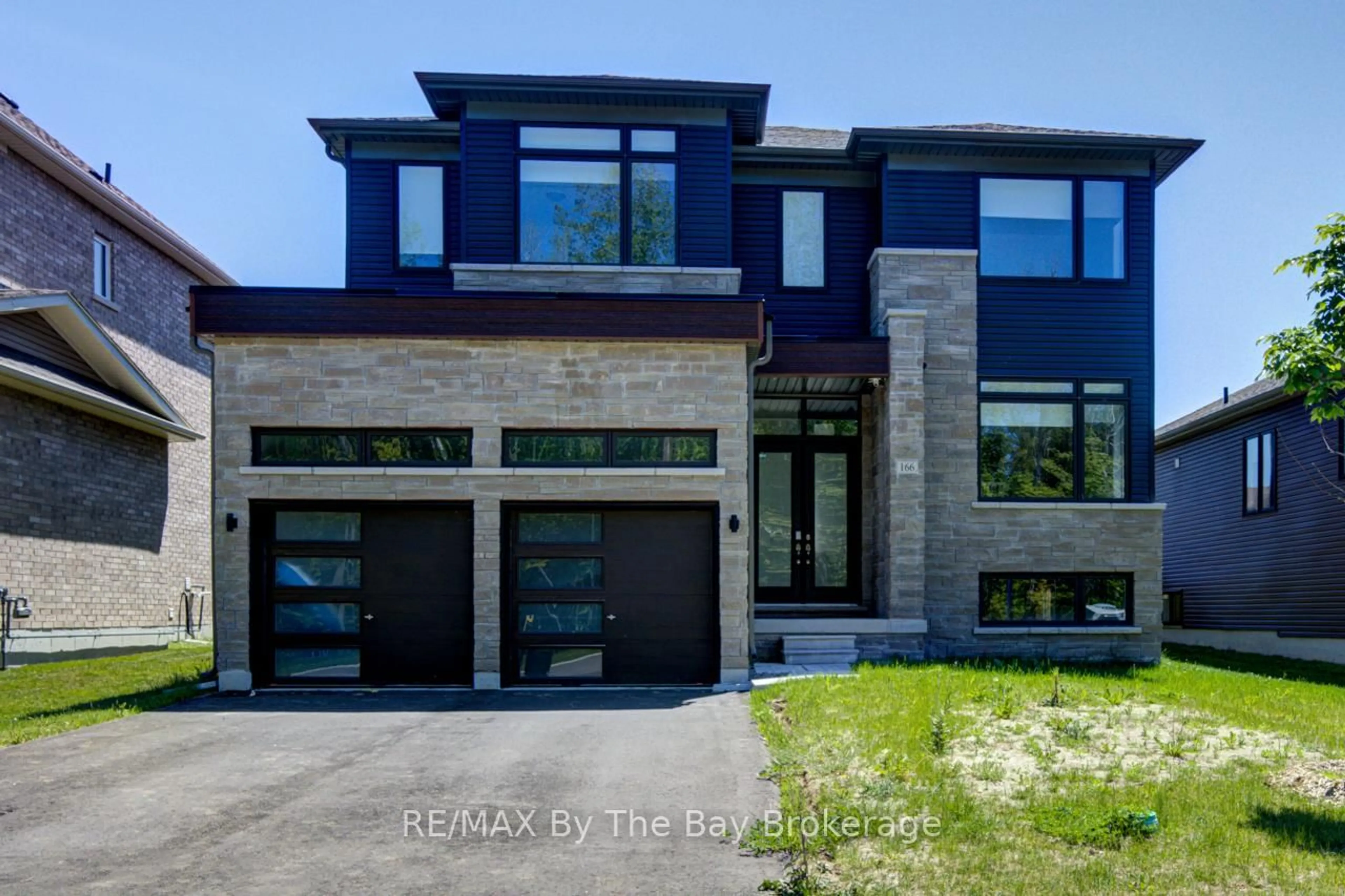 Home with brick exterior material, street for 166 Mapleside Dr, Wasaga Beach Ontario L9Z 3A5
