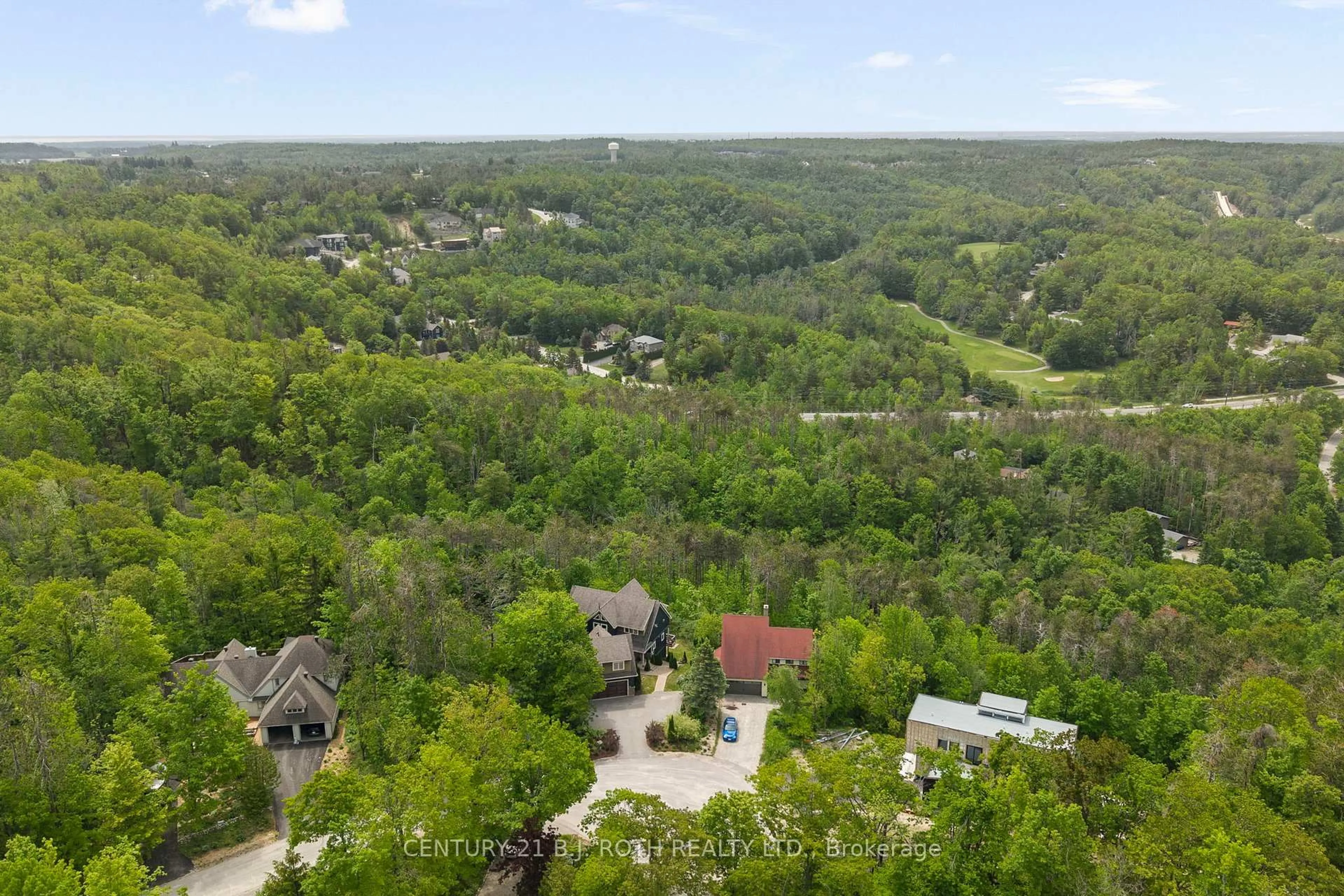 A pic from outside/outdoor area/front of a property/back of a property/a pic from drone, forest/trees view for 7 Pine Pt, Oro-Medonte Ontario L4M 4Y8
