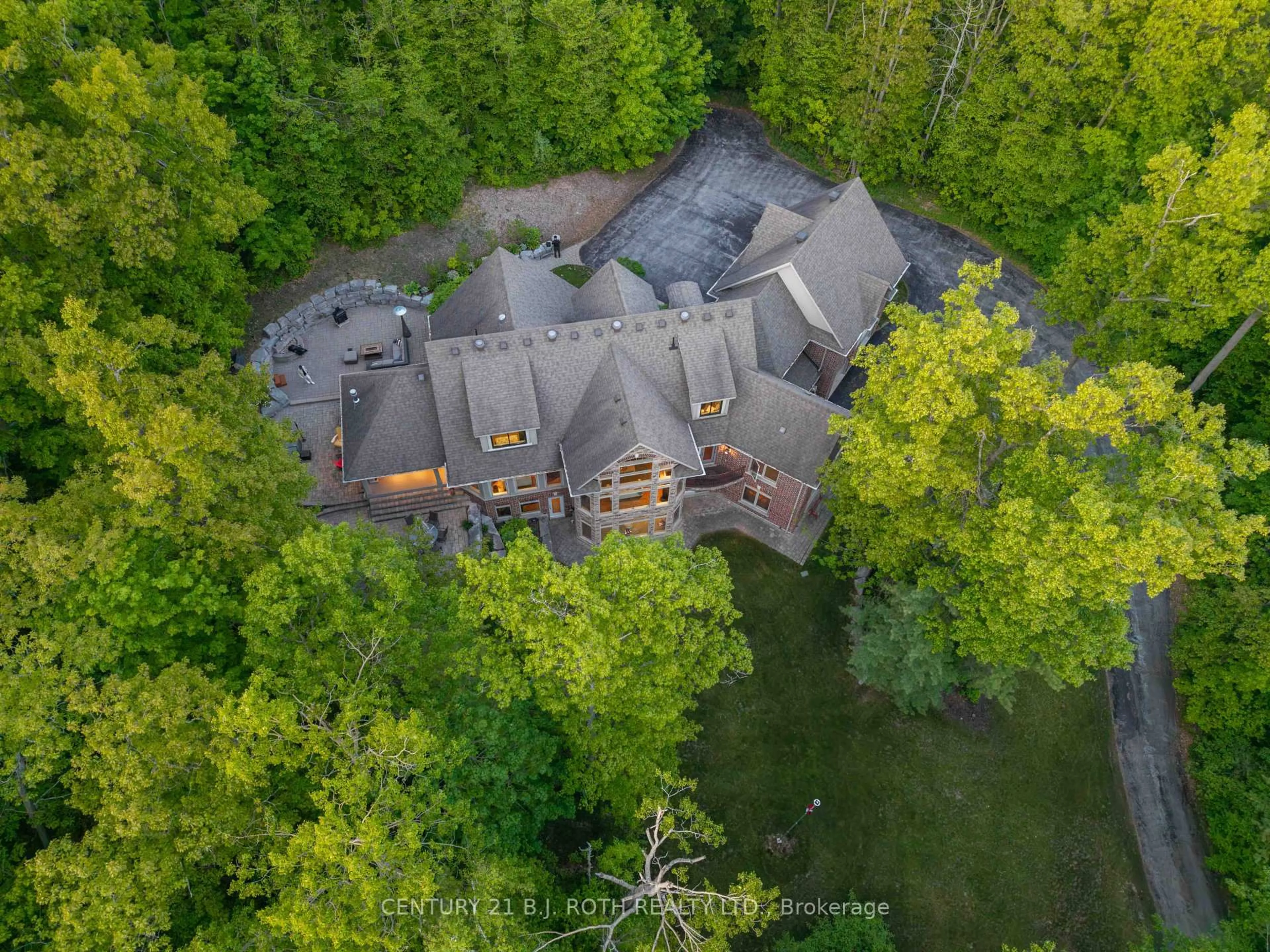 A pic from outside/outdoor area/front of a property/back of a property/a pic from drone, forest/trees view for 1 PIERCE Crt, Springwater Ontario L0L 1X0