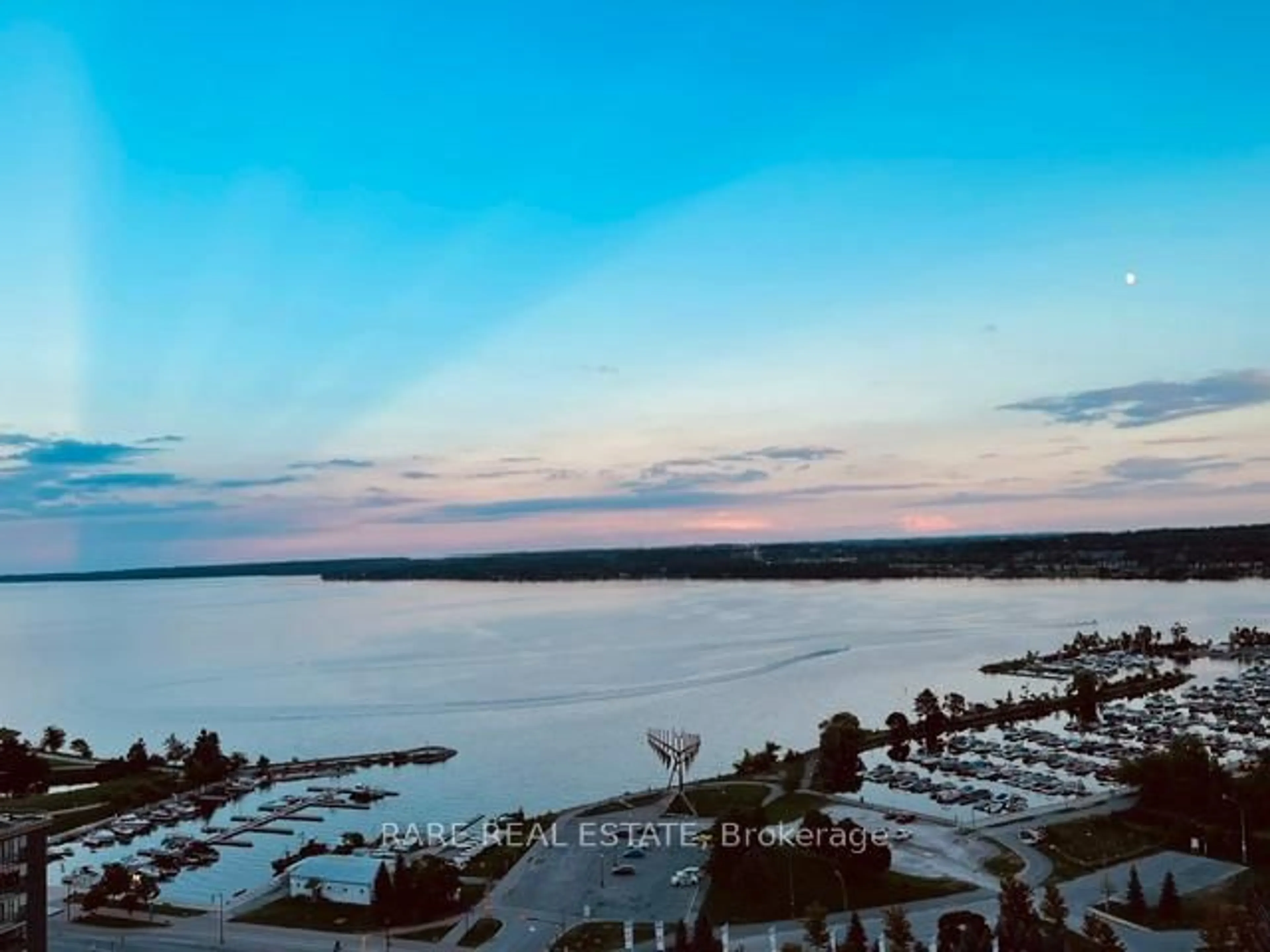 A pic from outside/outdoor area/front of a property/back of a property/a pic from drone, water/lake/river/ocean view for 39 Mary St #1810, Barrie Ontario L4N 1S9