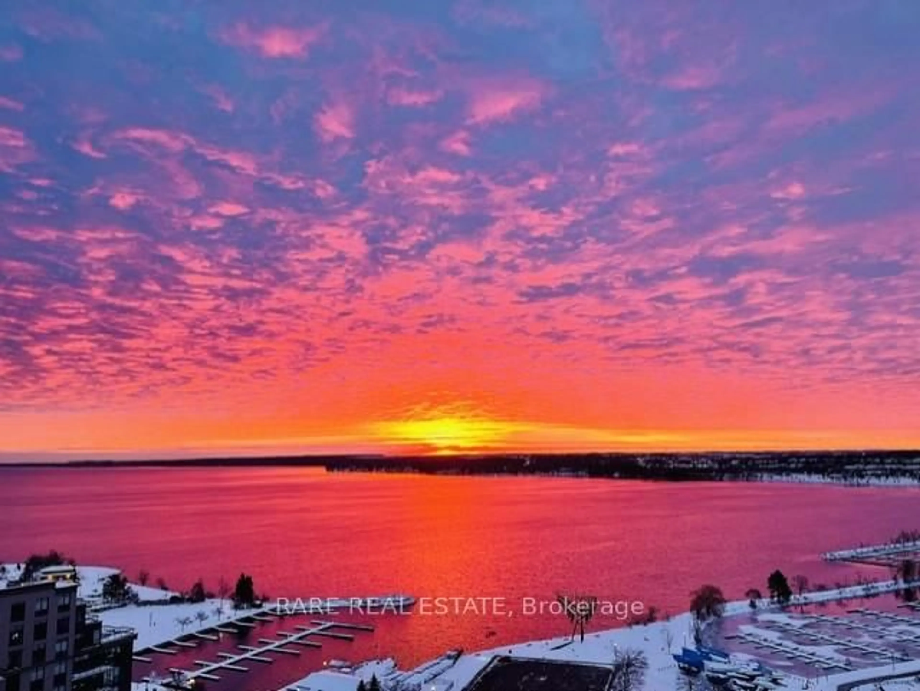 A pic from outside/outdoor area/front of a property/back of a property/a pic from drone, water/lake/river/ocean view for 39 Mary St #1810, Barrie Ontario L4N 1S9