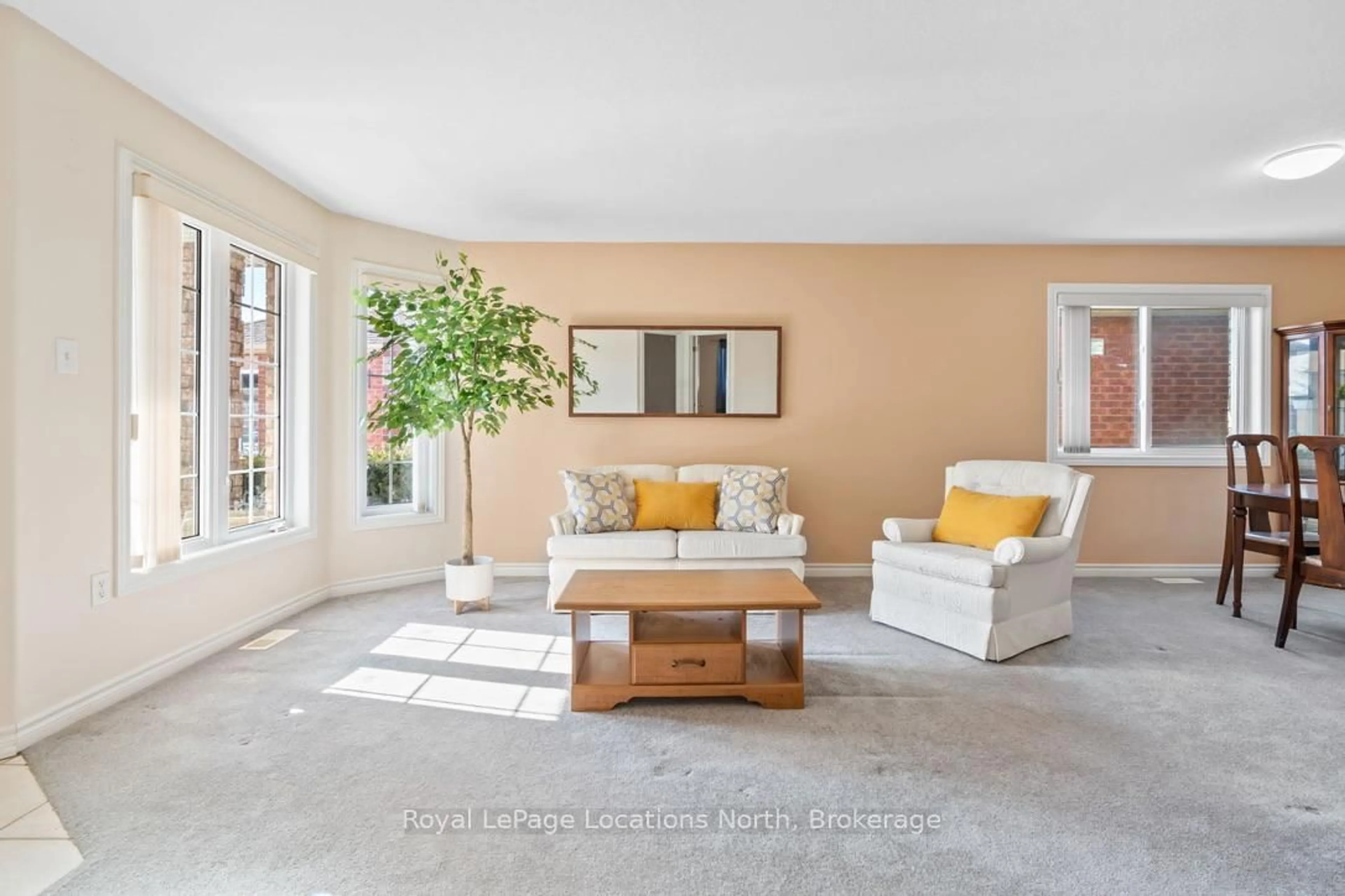 Living room with furniture, ceramic/tile floor for 83 White Elm Rd, Barrie Ontario L4N 0E4